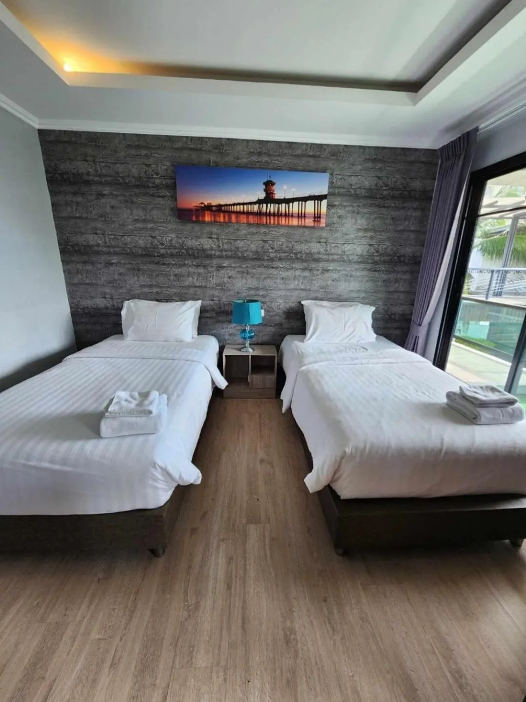 Bed in The Tamnan Pattaya Hotel & Resort