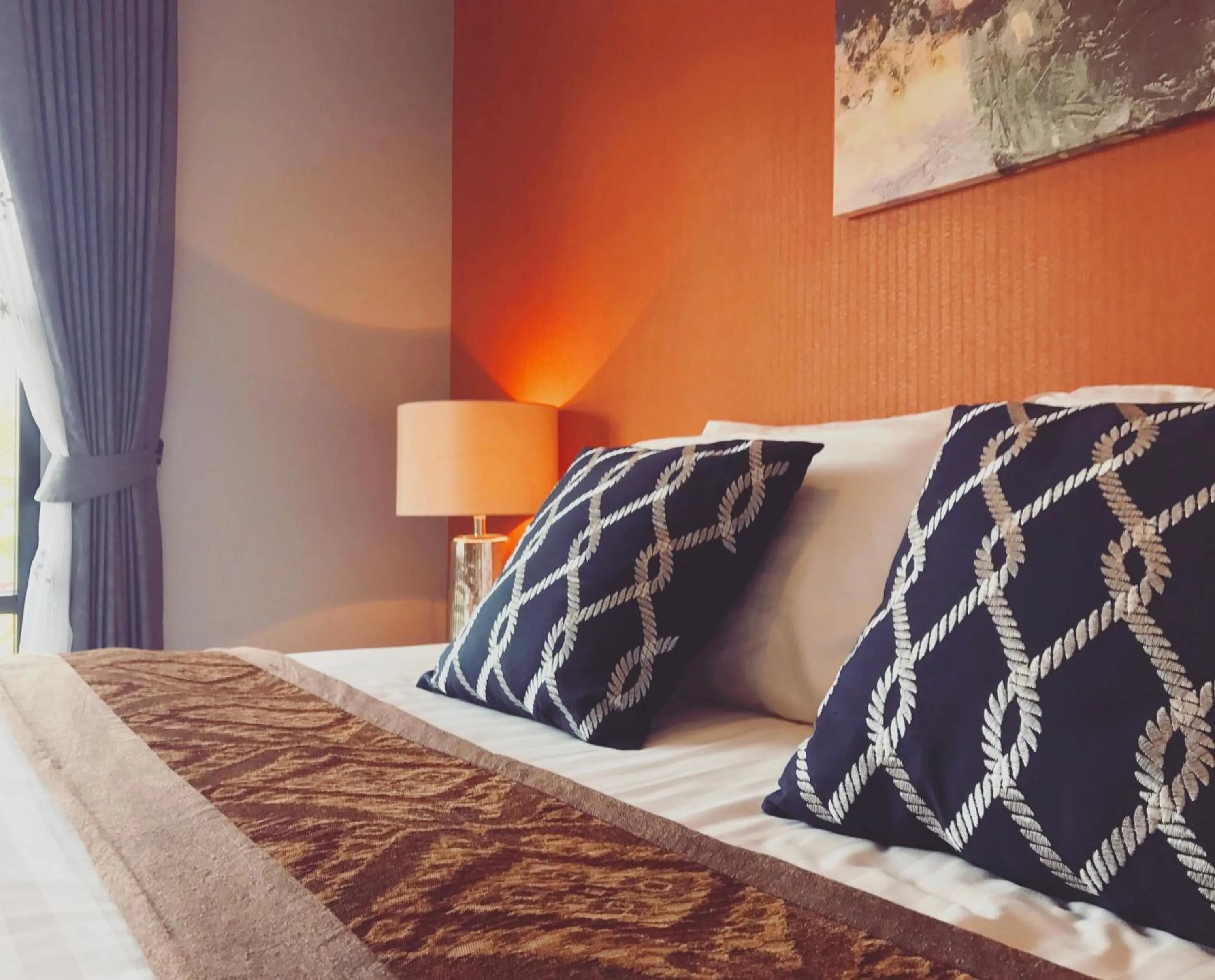 Bed in The Tamnan Pattaya Hotel & Resort