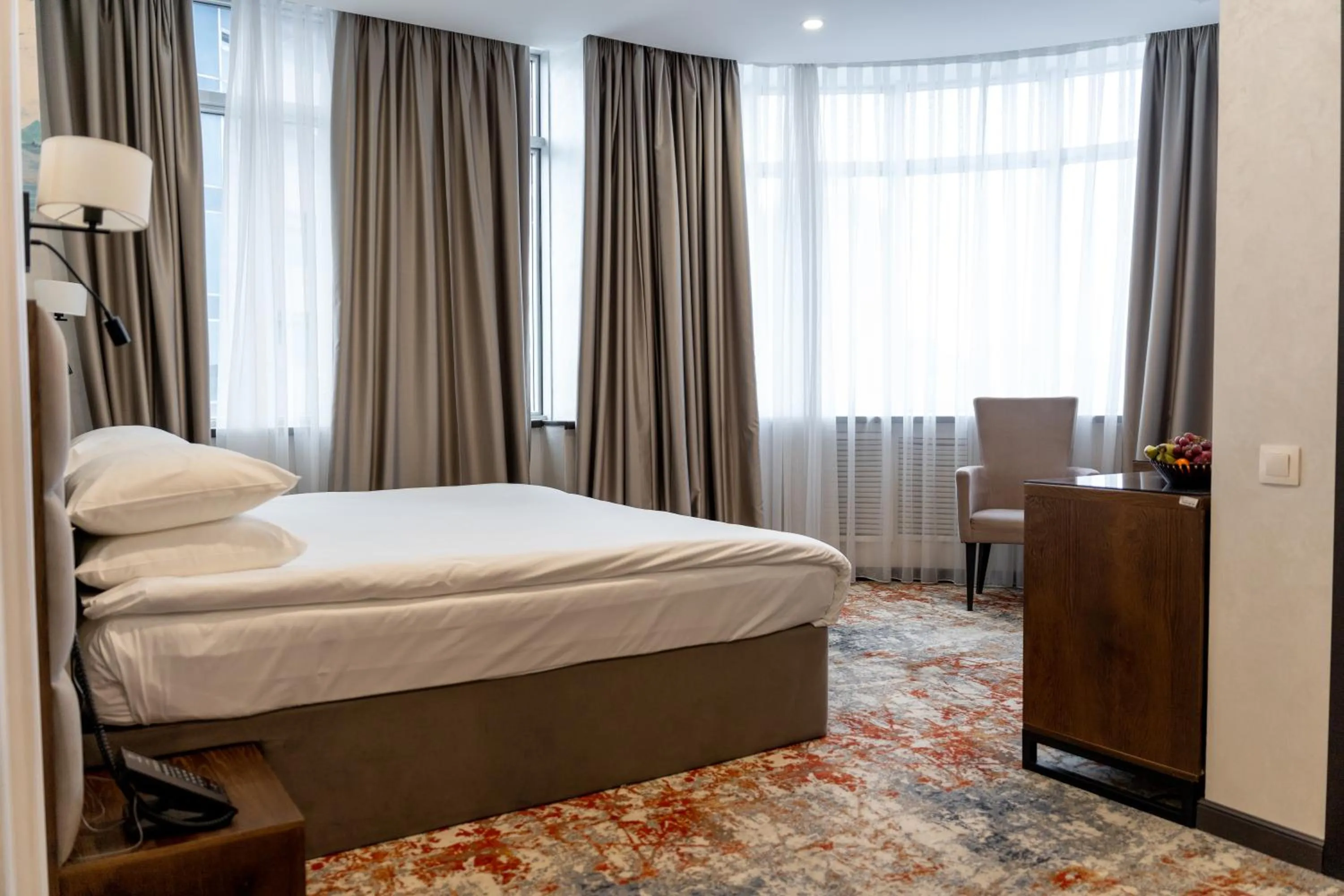 Bed in Grand Mildom Hotel