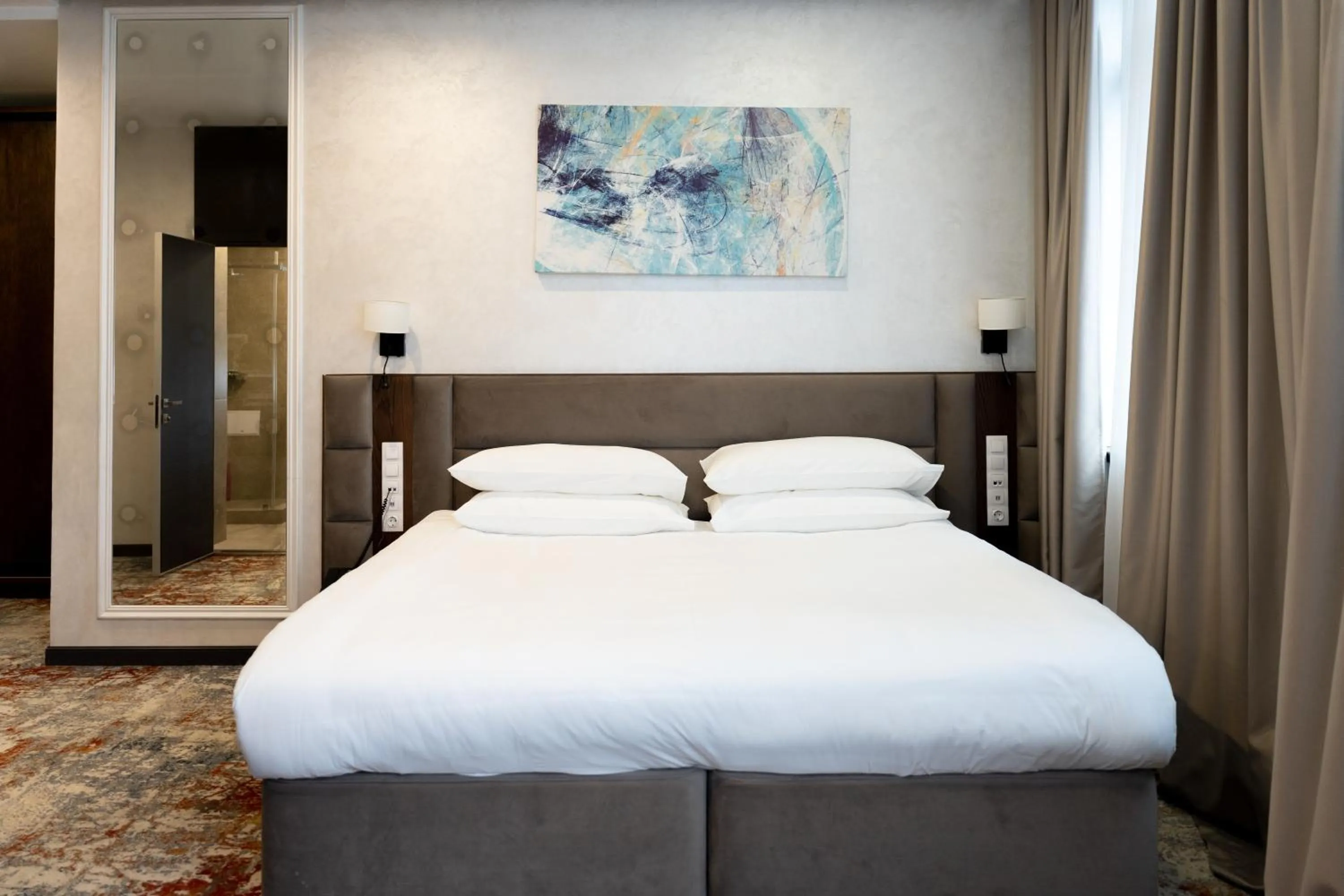 Bed in Grand Mildom Hotel