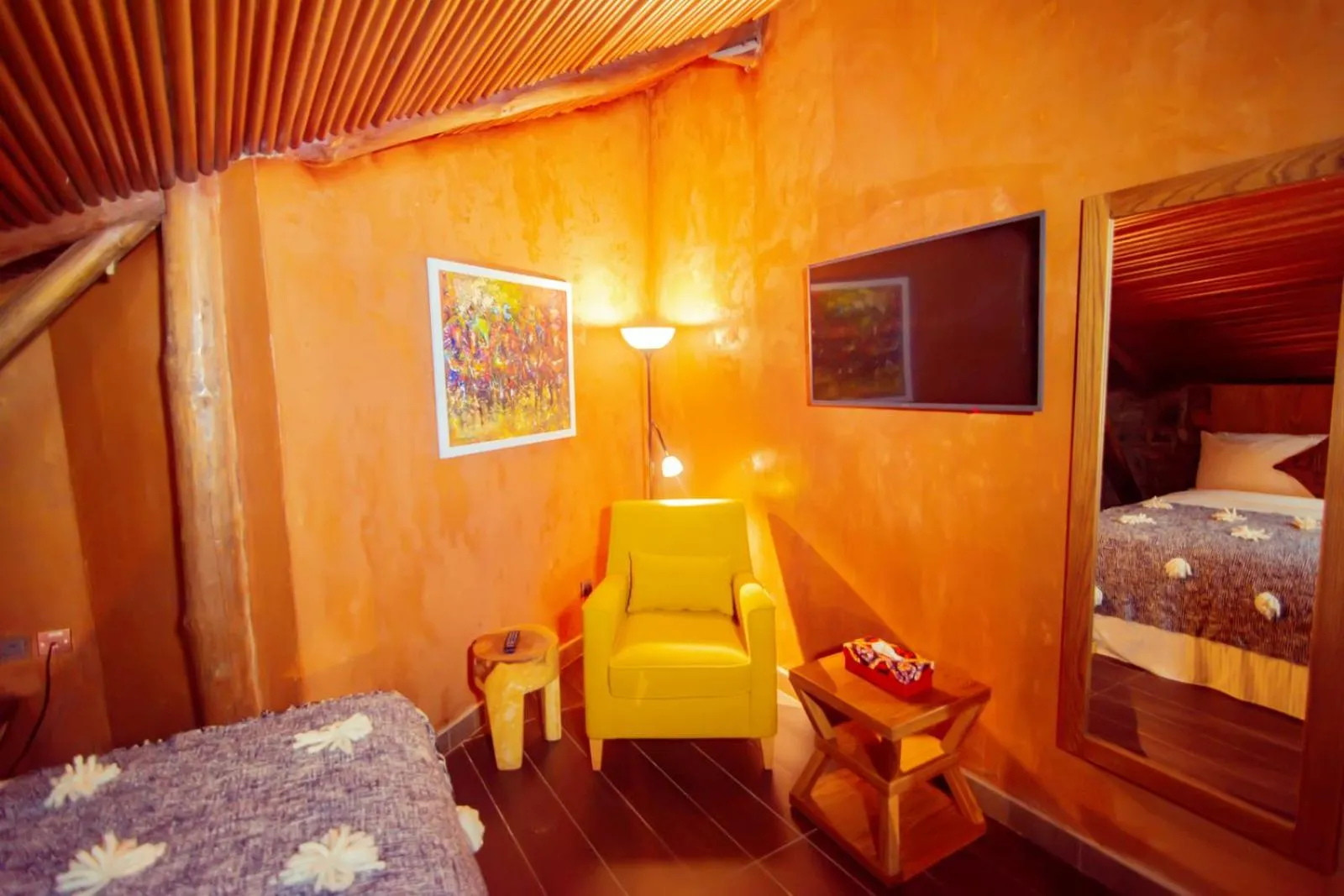 Seating area, Bed in Trois Ore Residences & Green Earth Bistro