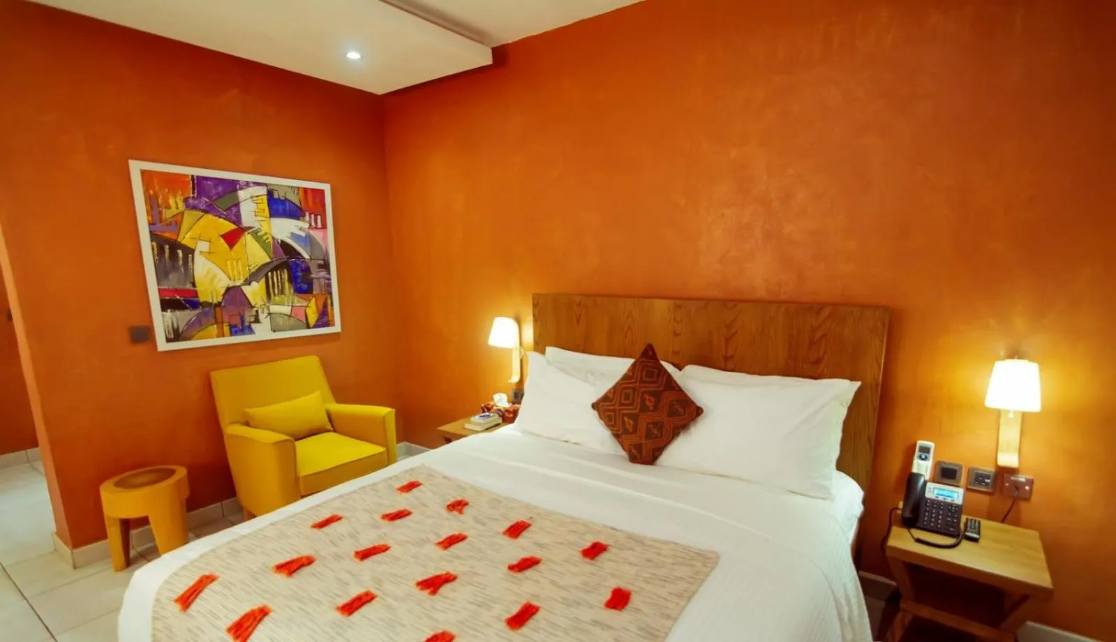Bed in Trois Ore Residences & Green Earth Bistro