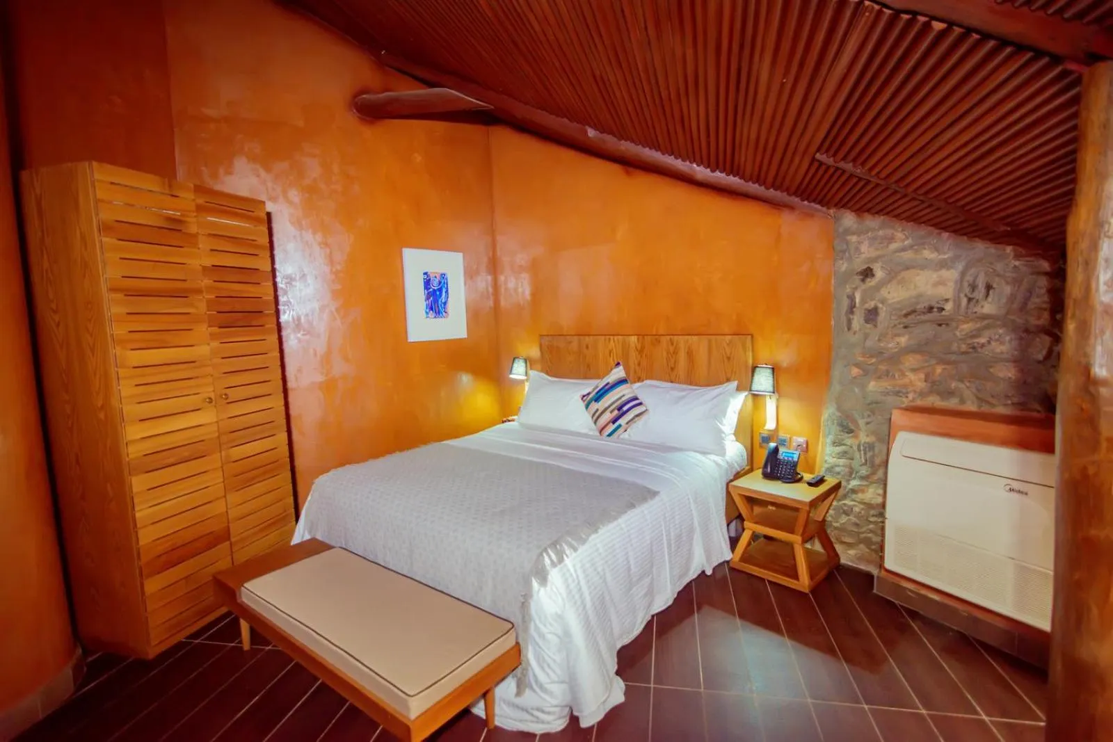 Bed in Trois Ore Residences & Green Earth Bistro