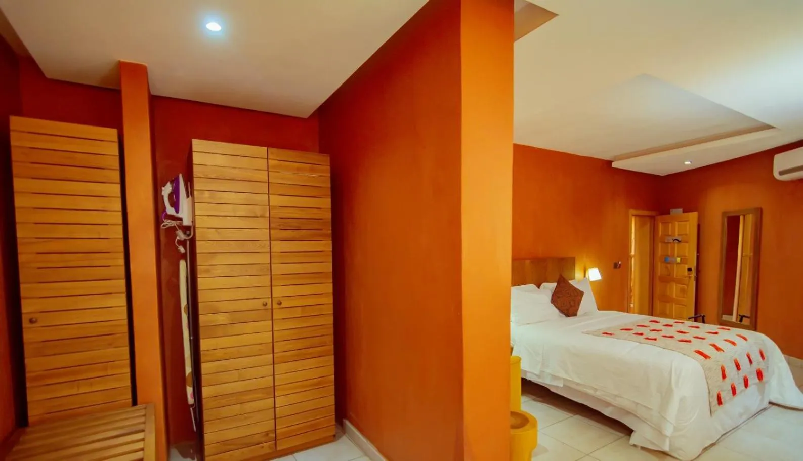 Bed in Trois Ore Residences & Green Earth Bistro