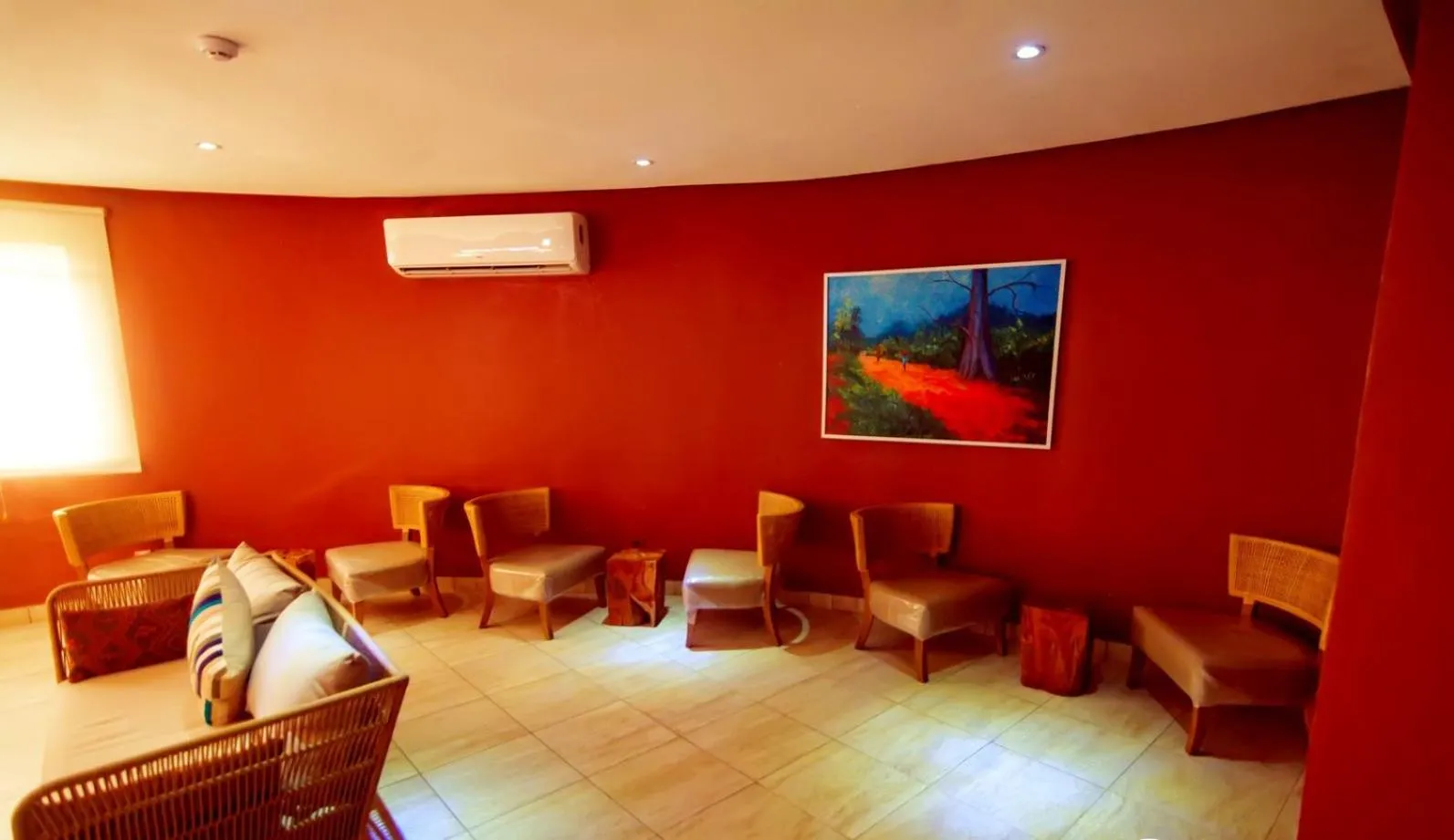 Communal lounge/ TV room in Trois Ore Residences & Green Earth Bistro