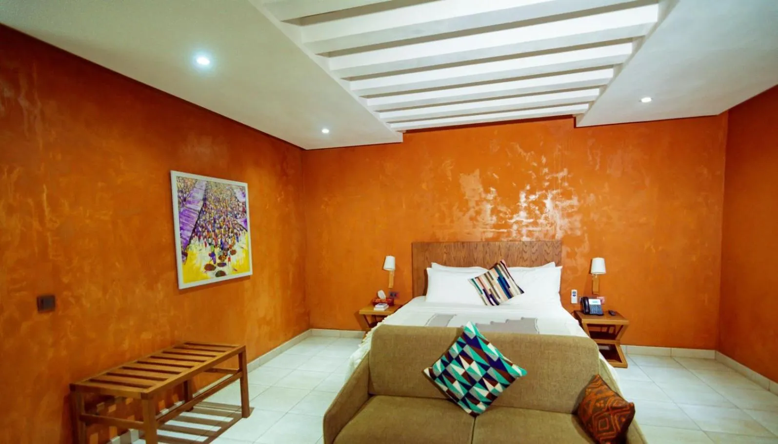 Bed in Trois Ore Residences & Green Earth Bistro