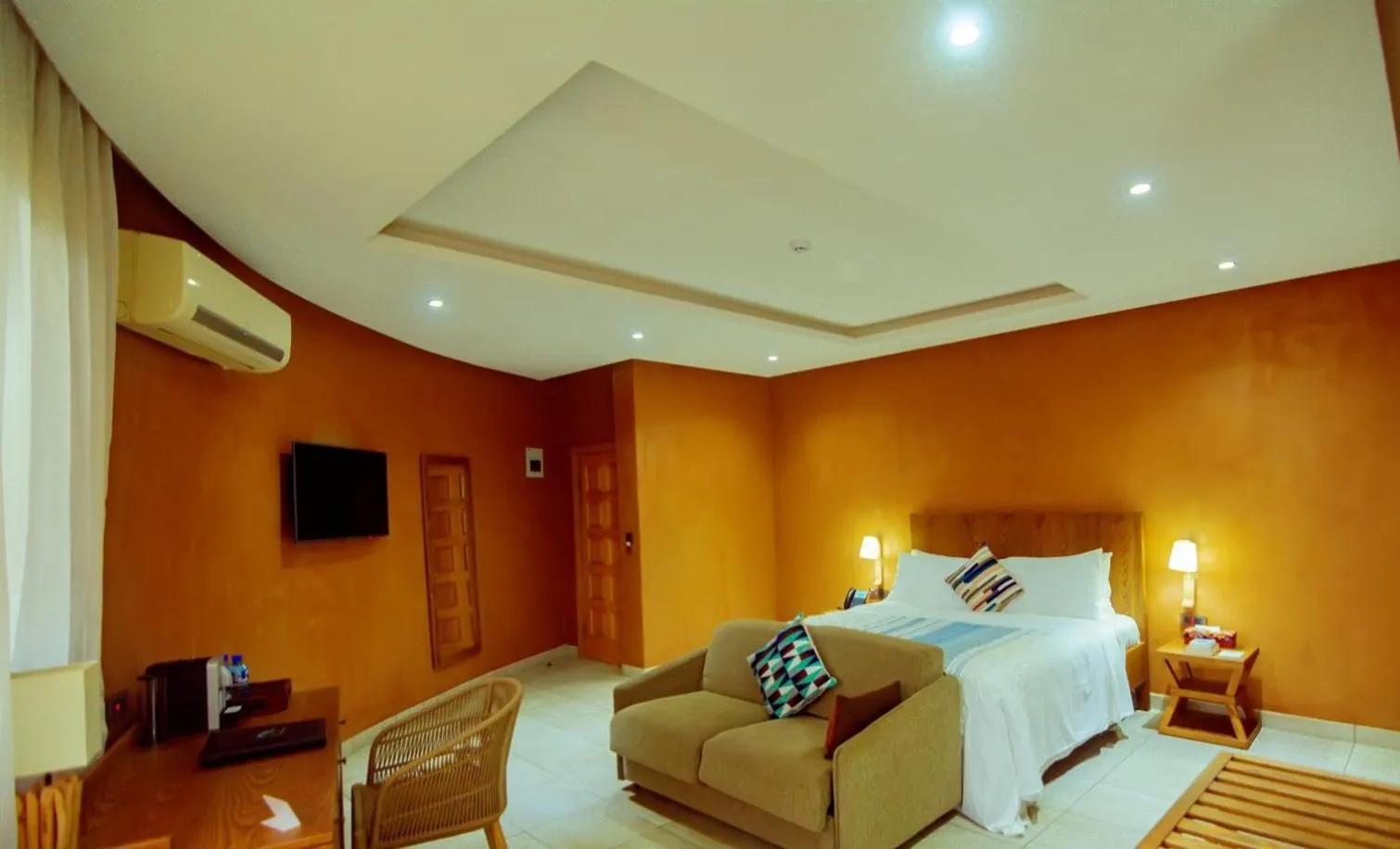 Bed in Trois Ore Residences & Green Earth Bistro