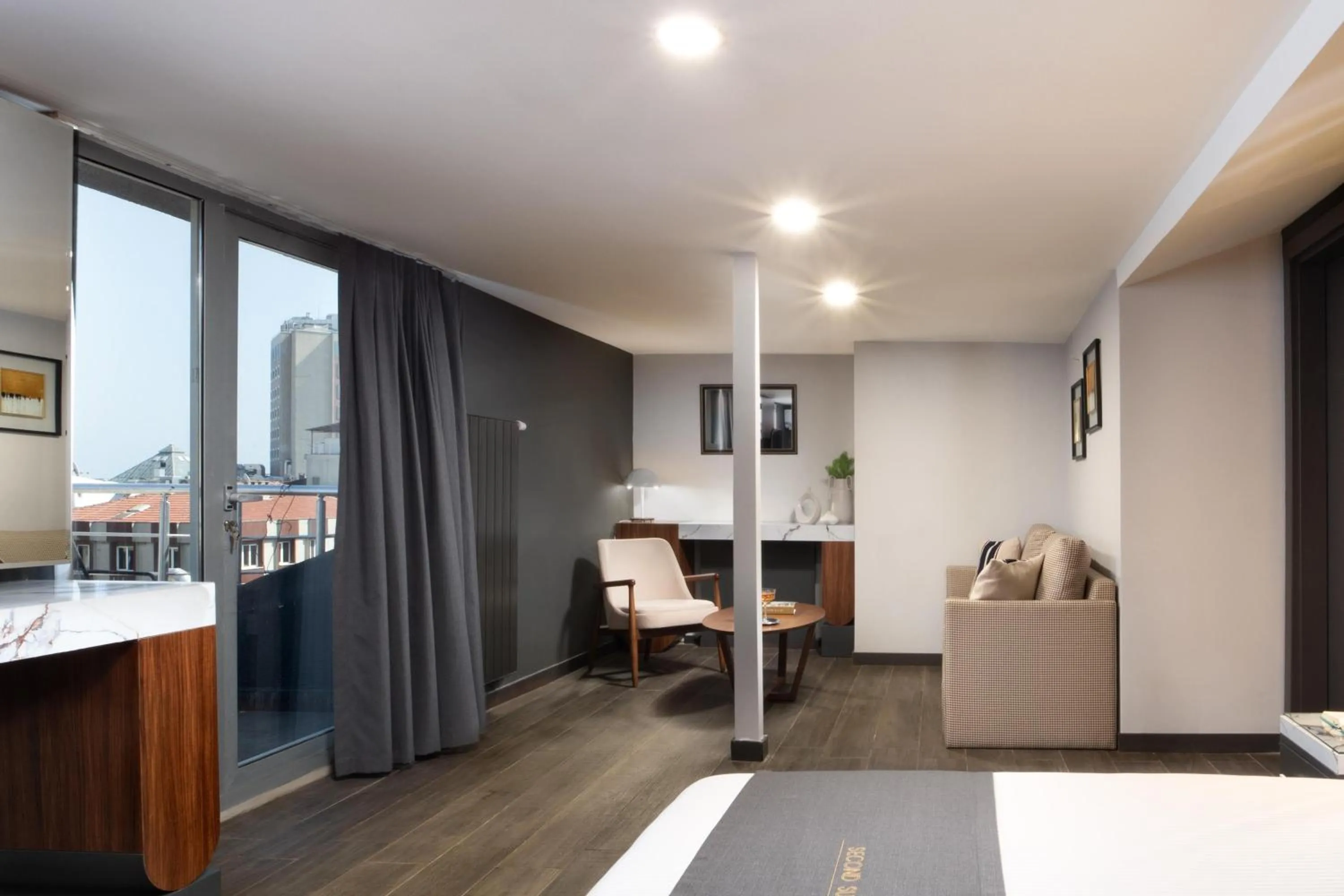 Seating area, Bed in Second Suit Hotel