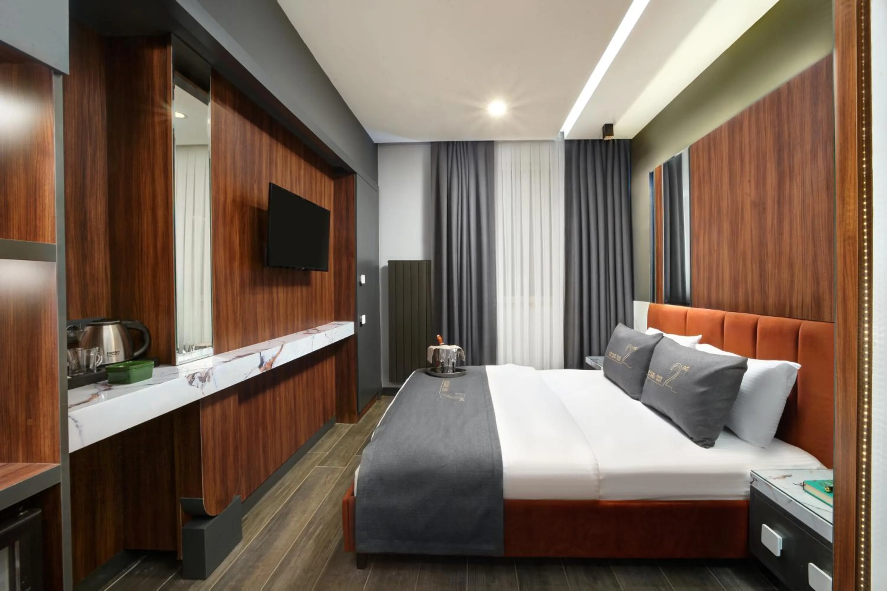 Bed in Second Suit Hotel