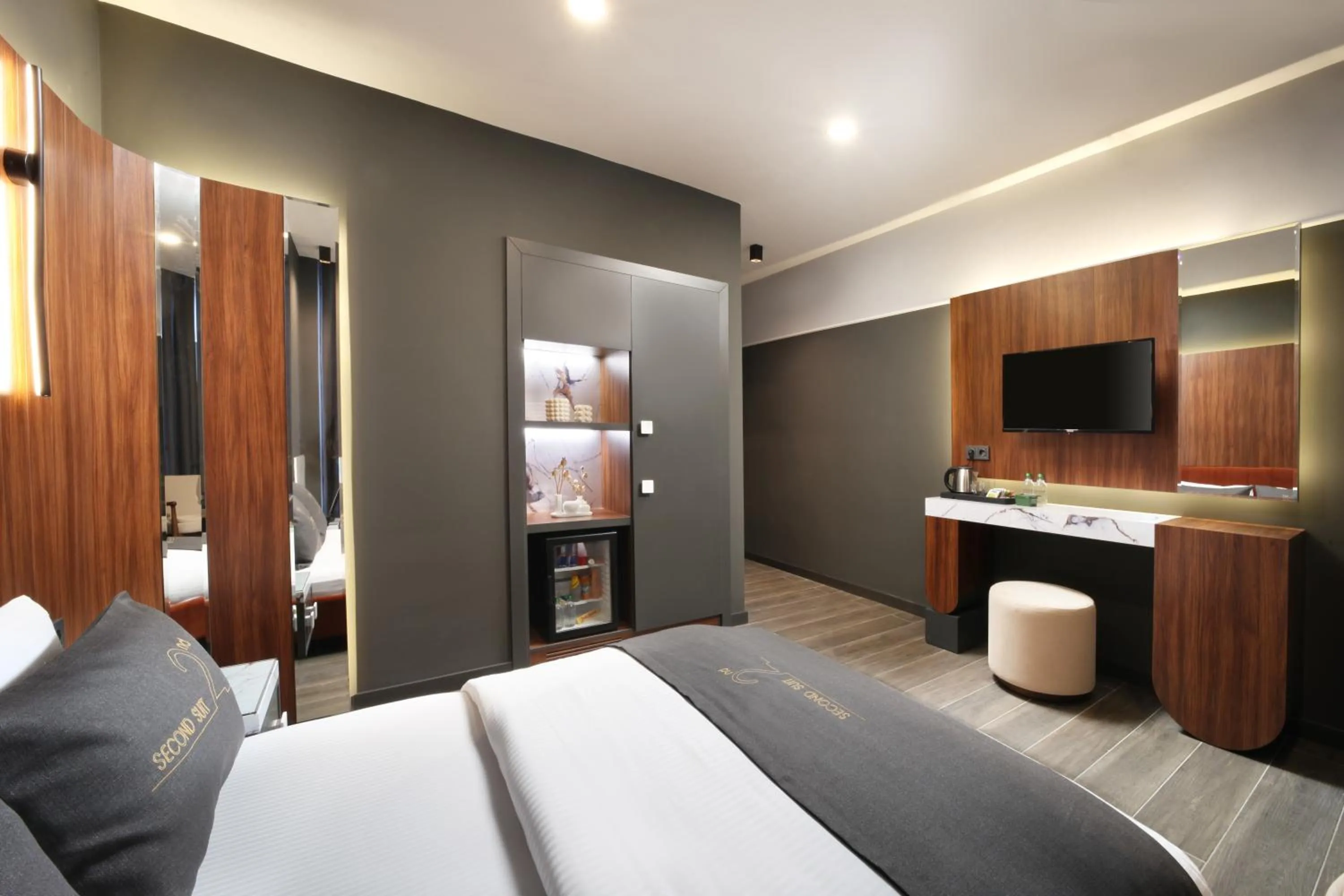 Bed in Second Suit Hotel