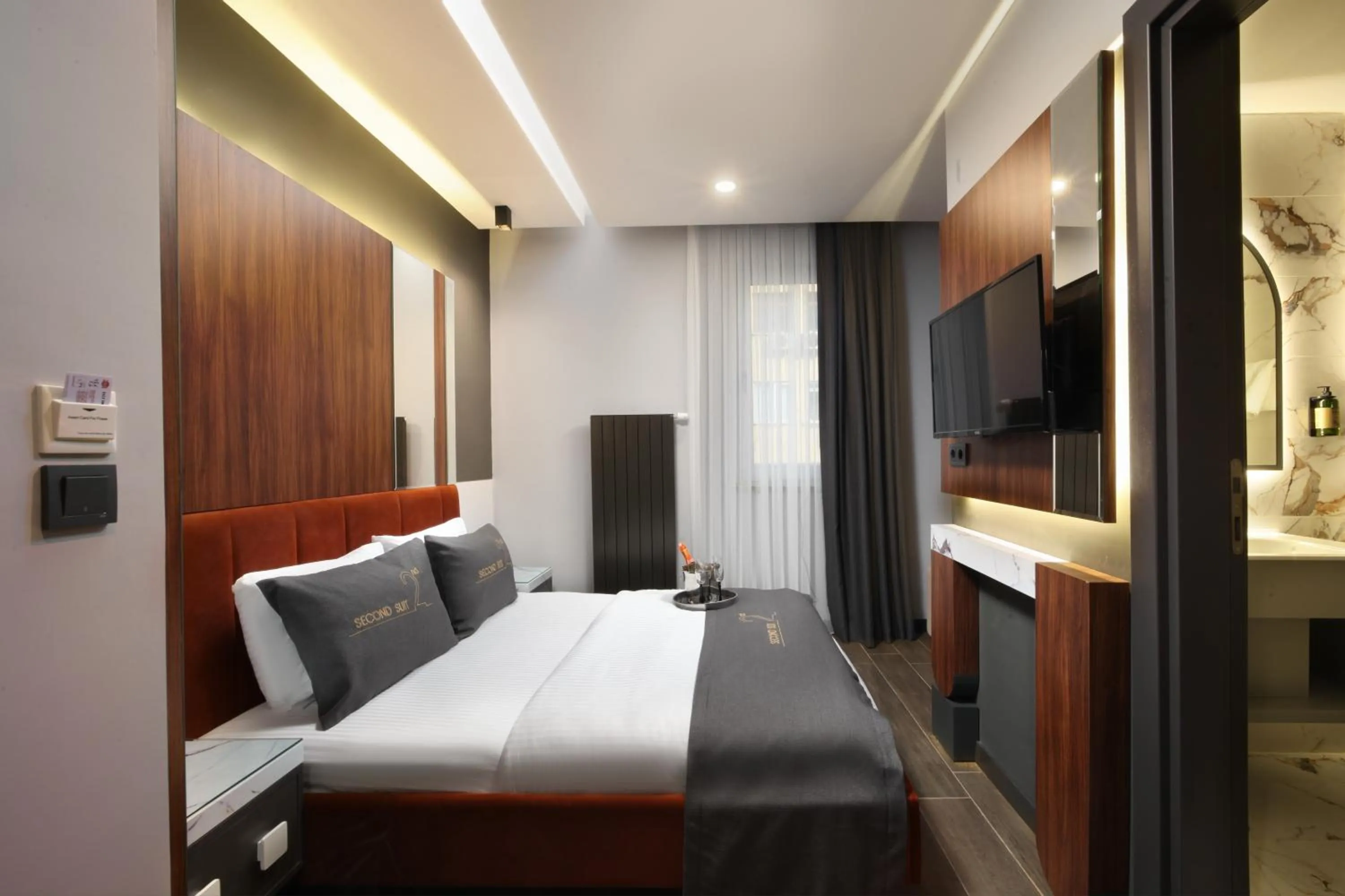 Bed in Second Suit Hotel