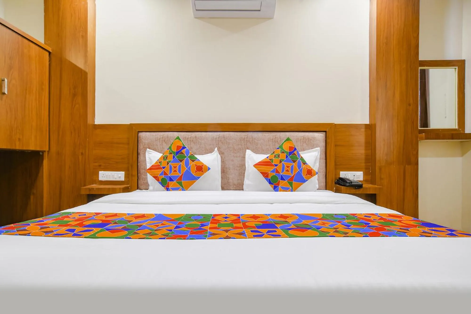 Bed in FabHotel Atharv