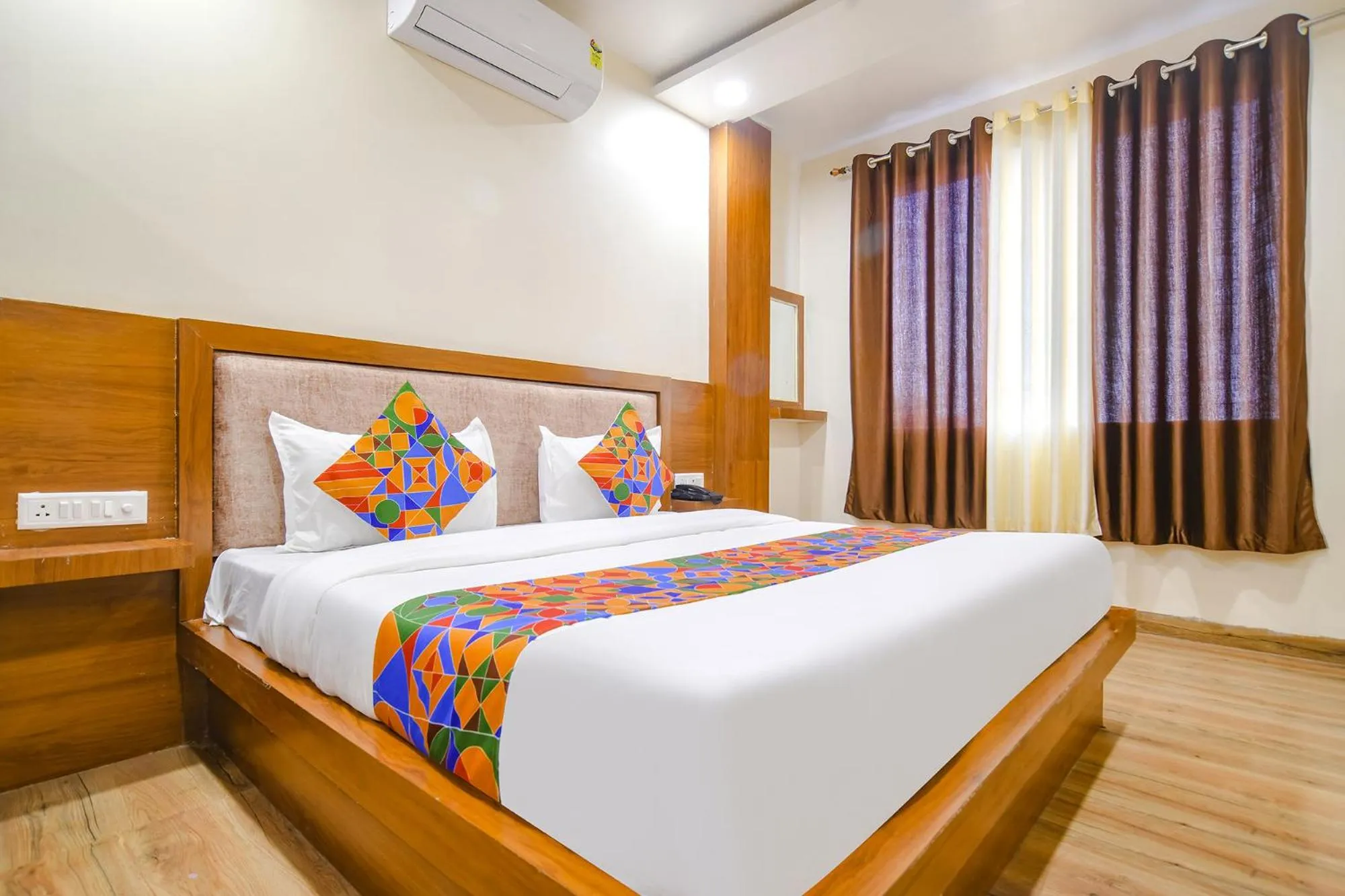 Bed in FabHotel Atharv