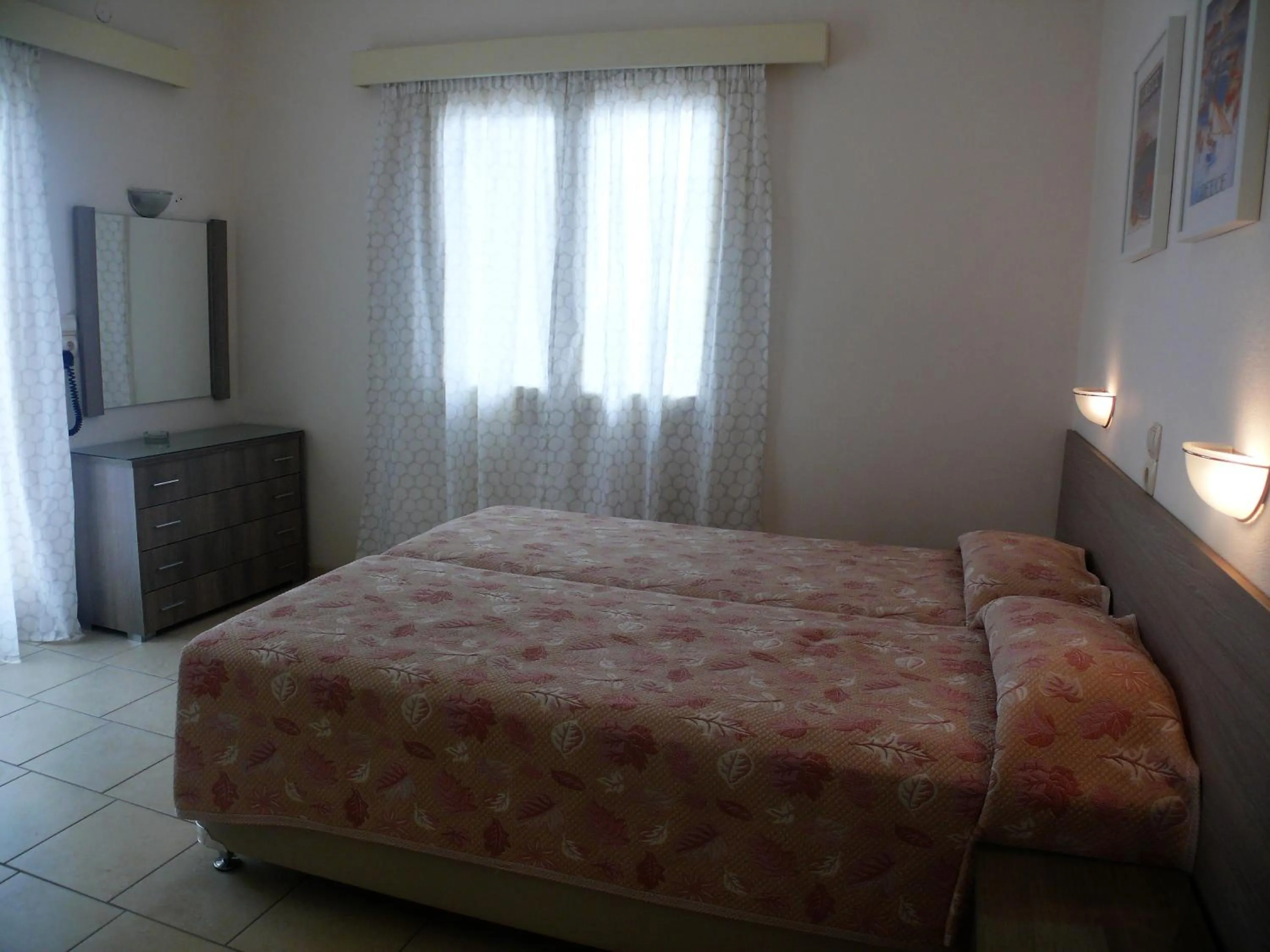 Bed in Hotel Karyatides