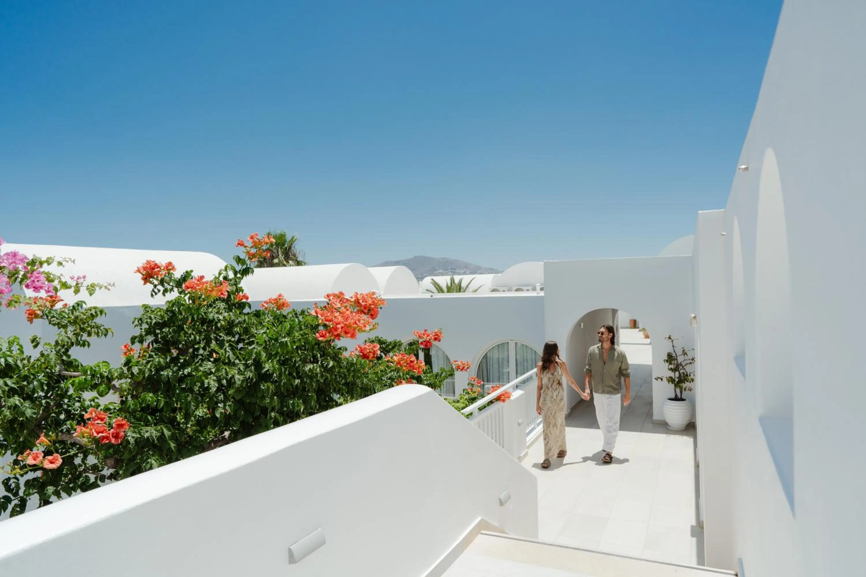 People in Aressana Spa Hotel & Suites - Small Luxury Hotels of the World