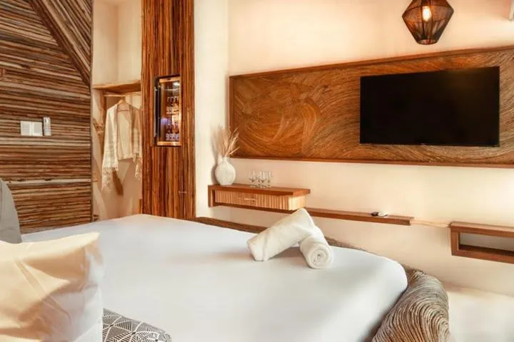 Bed in CervecerIa Tulum Boutique Hotel & Beer Spa