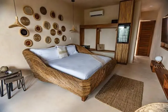 Bed in CervecerIa Tulum Boutique Hotel & Beer Spa