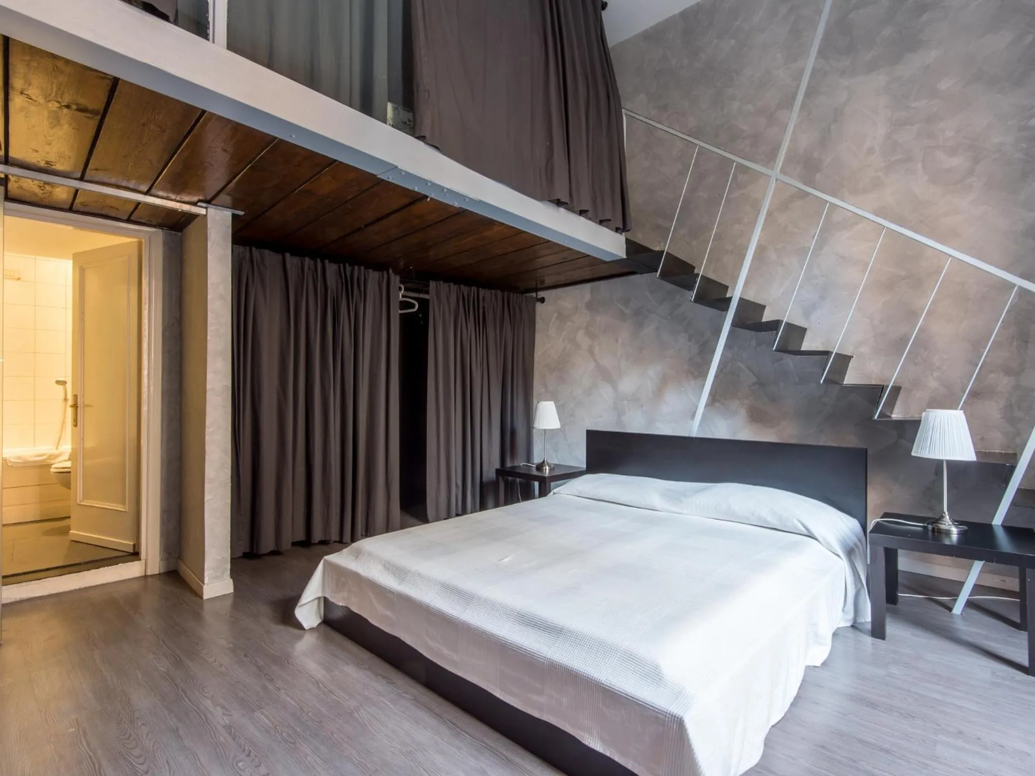 Bed in Ara Pacis Navona Apartments