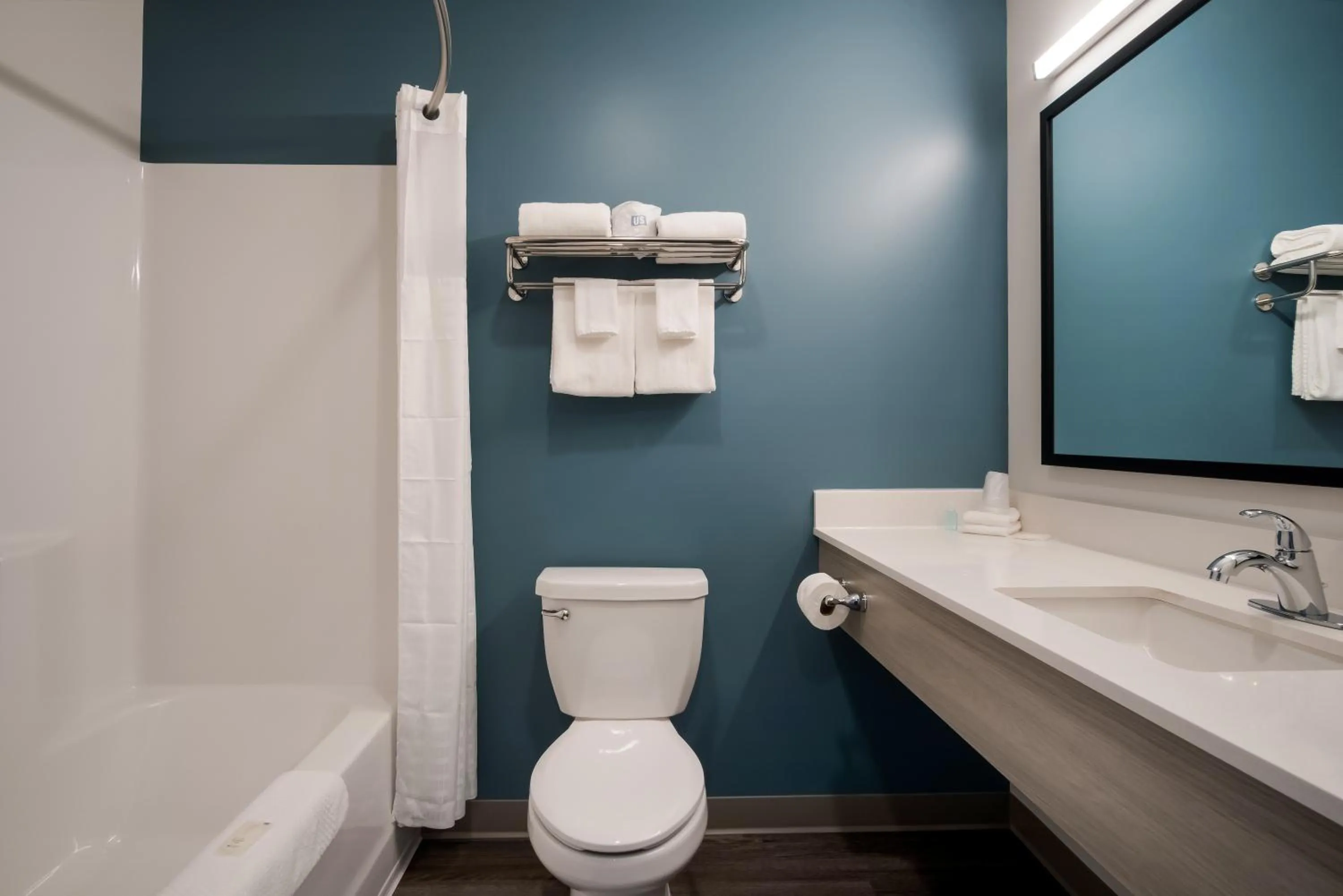 Bathroom in WoodSpring Suites Grand Rapids Kentwood