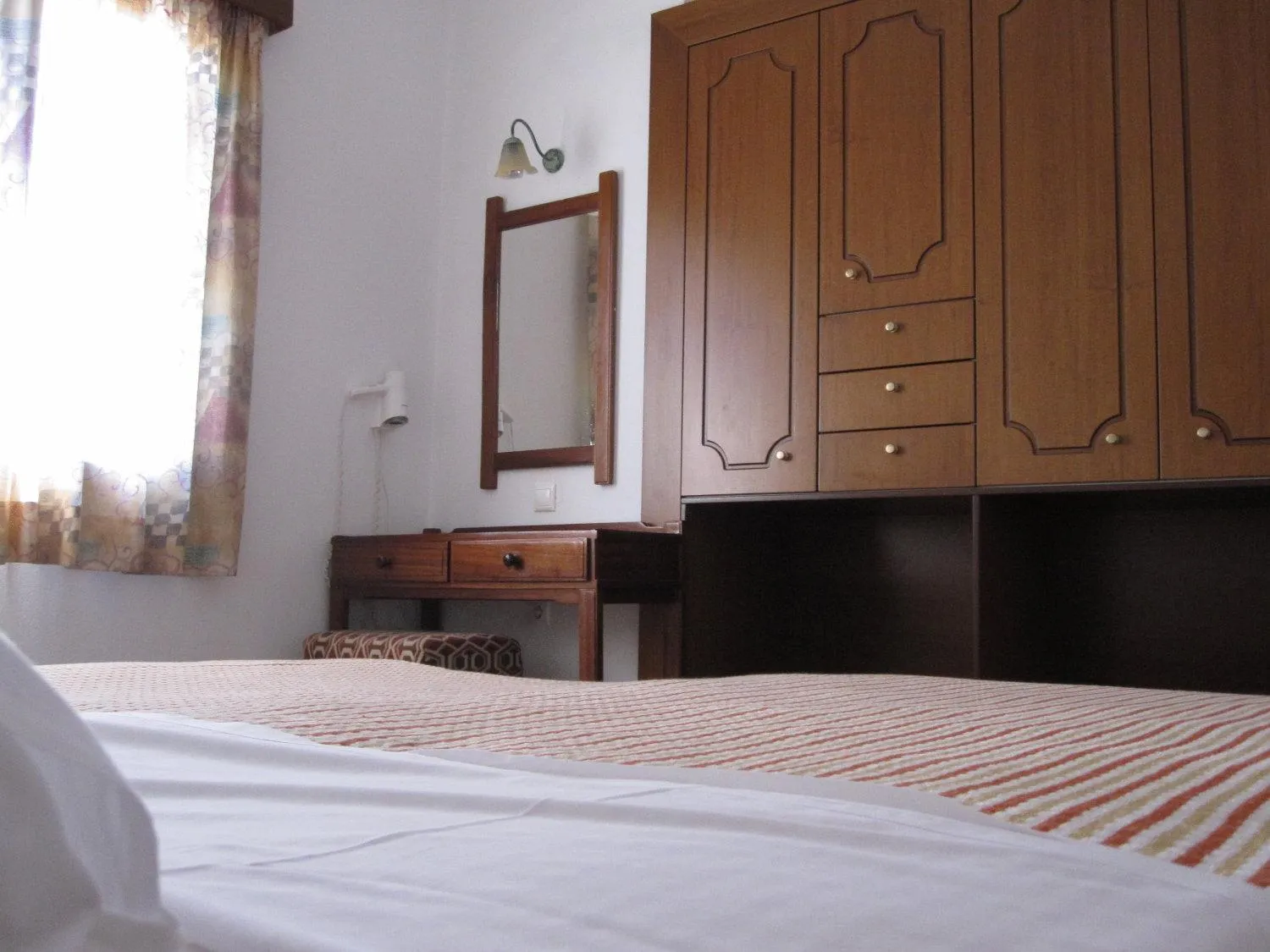 Bed in Amazones Villas Apartments