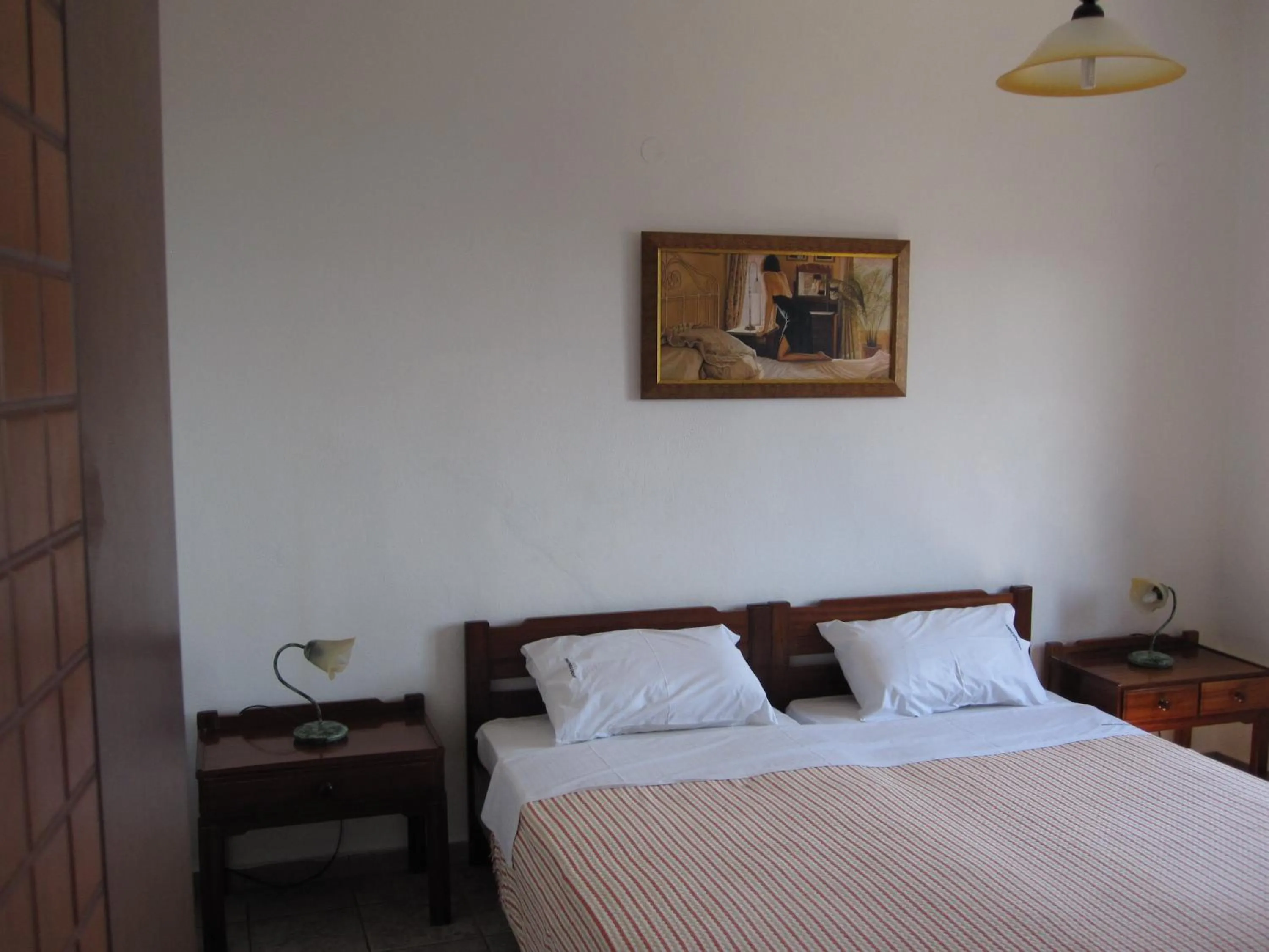 Bed in Amazones Villas Apartments