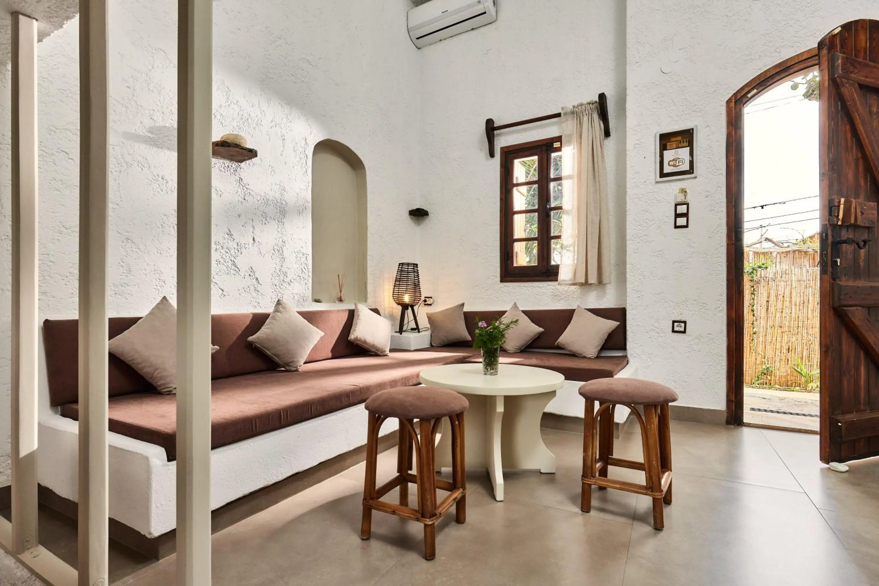 Living room, Bed in Mila Malia Studios Hotel