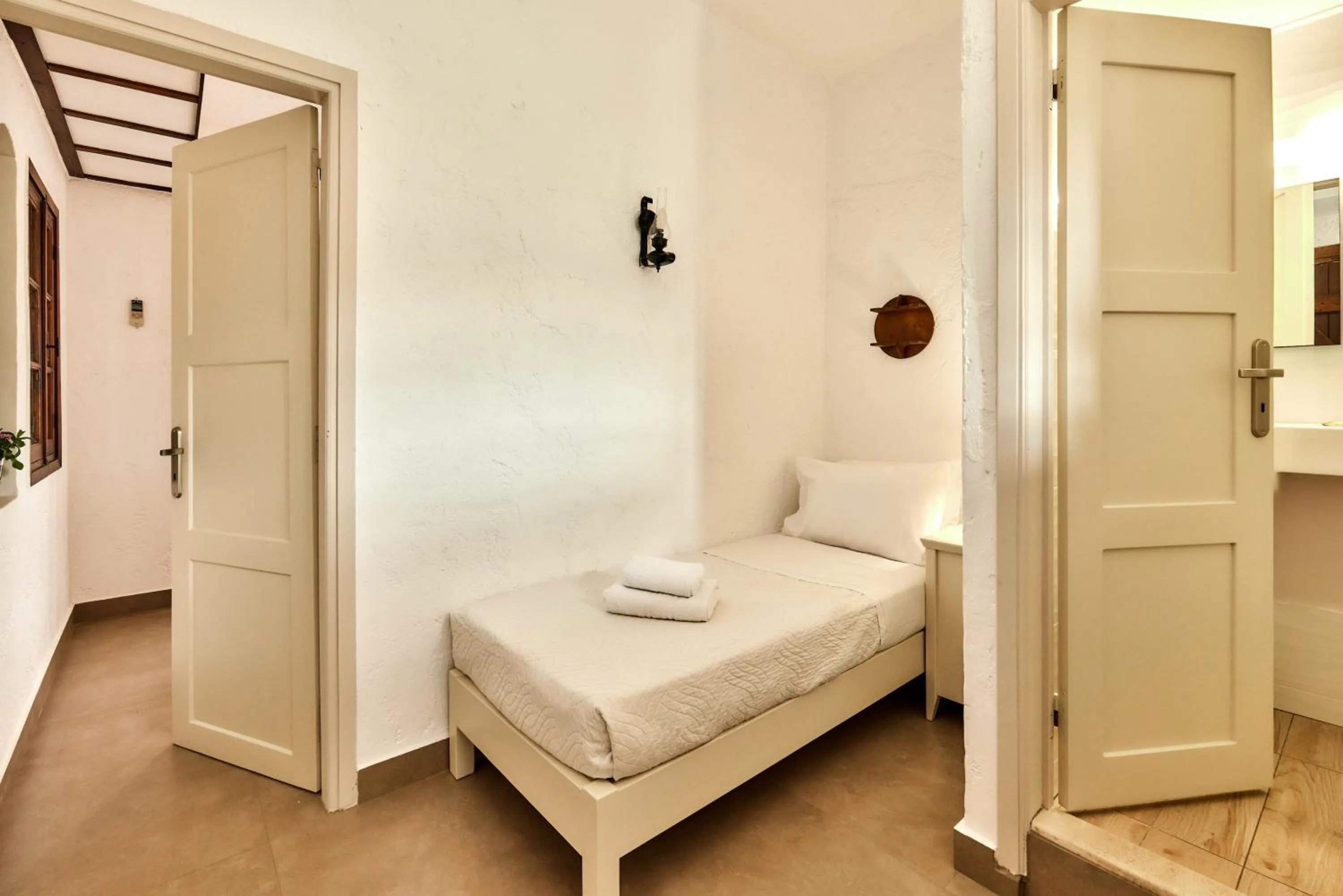 Bed in Mila Malia Studios Hotel