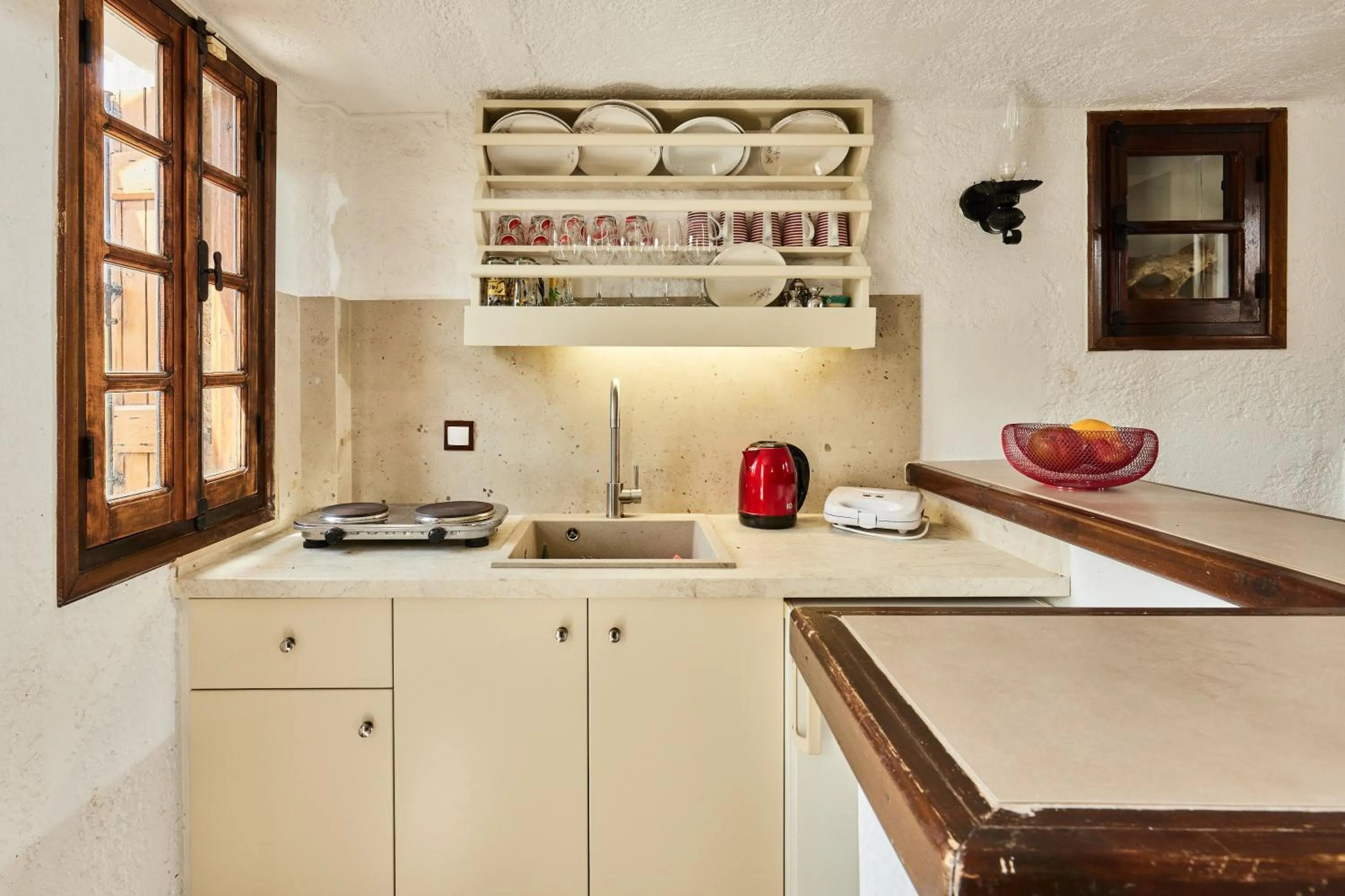 kitchen in Mila Malia Studios Hotel