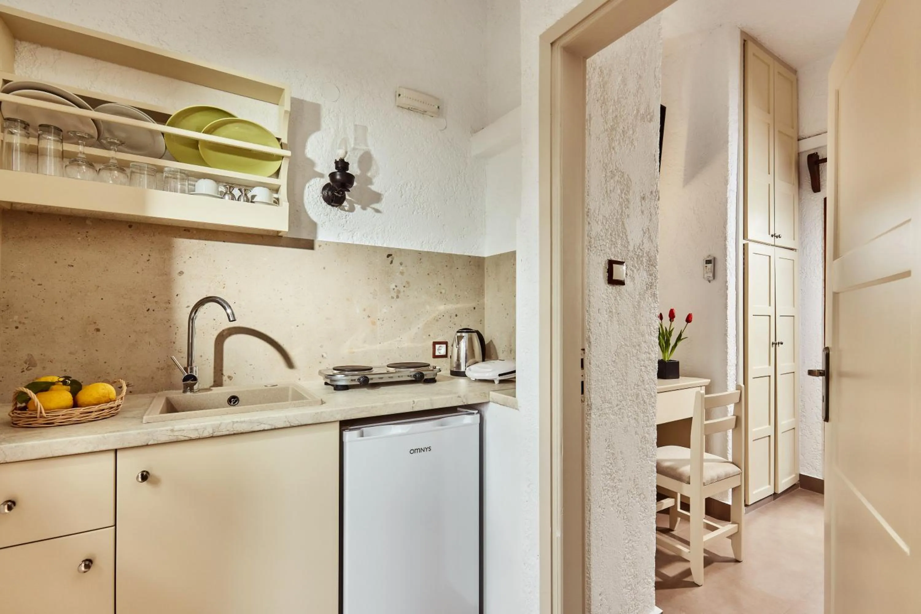 kitchen in Mila Malia Studios Hotel