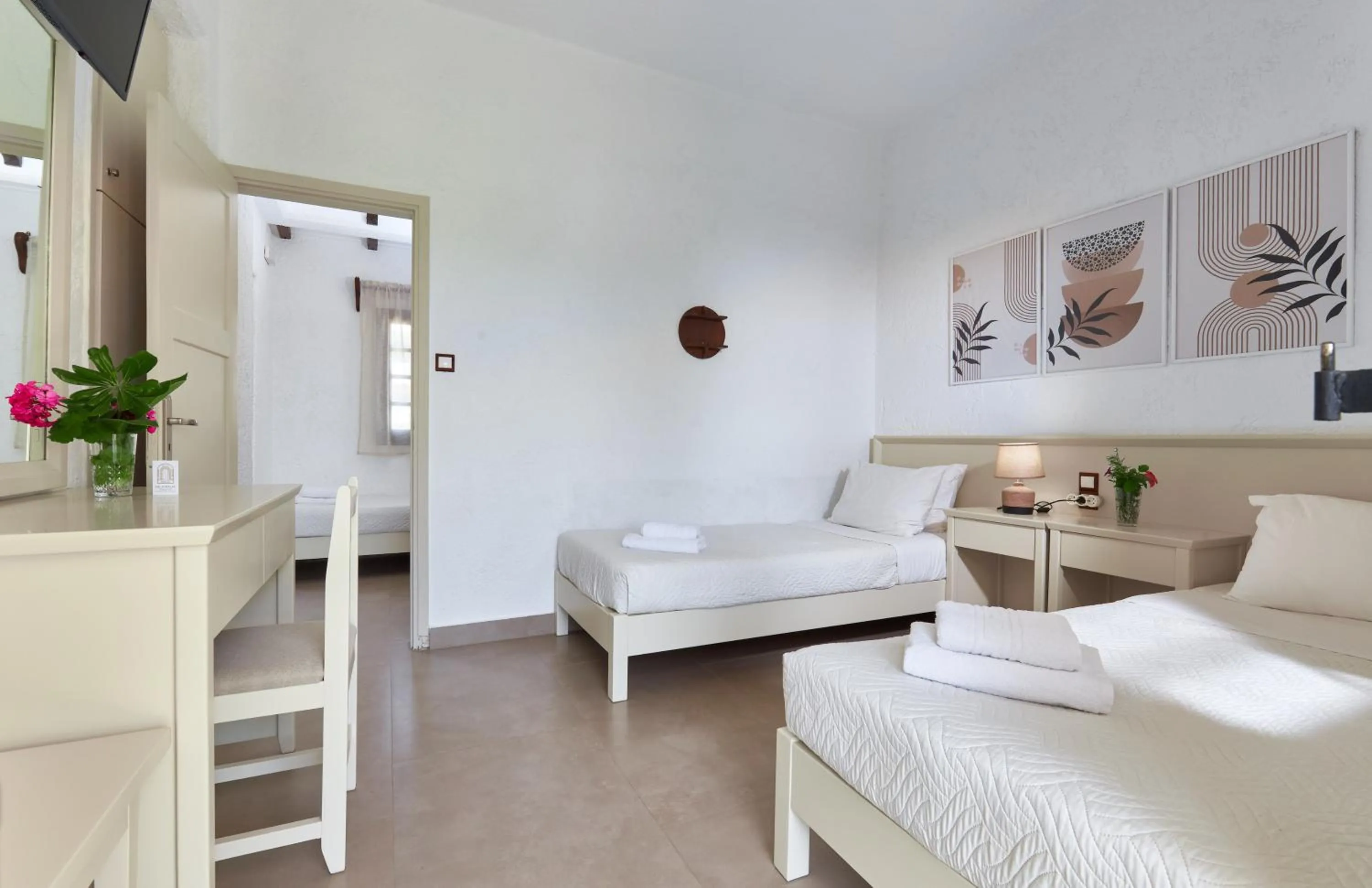 Bed in Mila Malia Studios Hotel