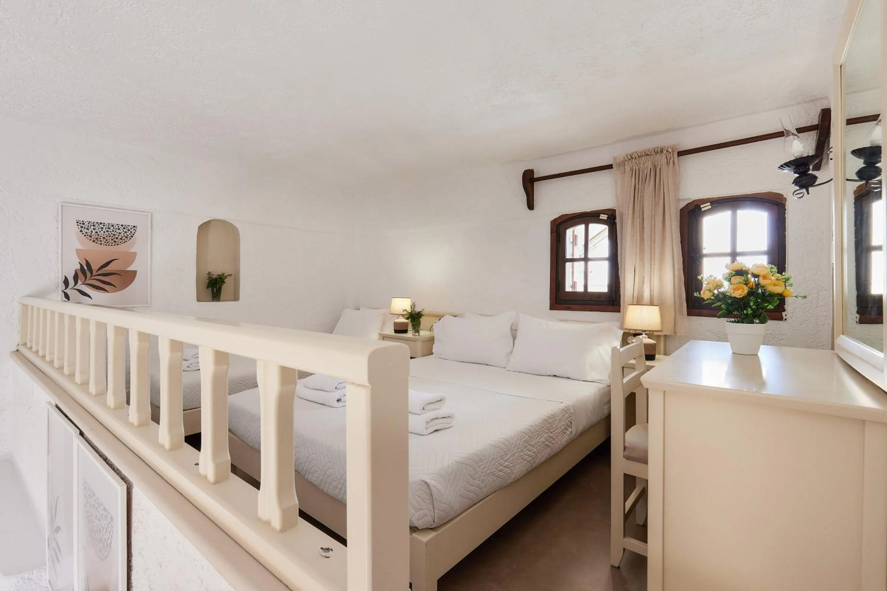 Bed in Mila Malia Studios Hotel