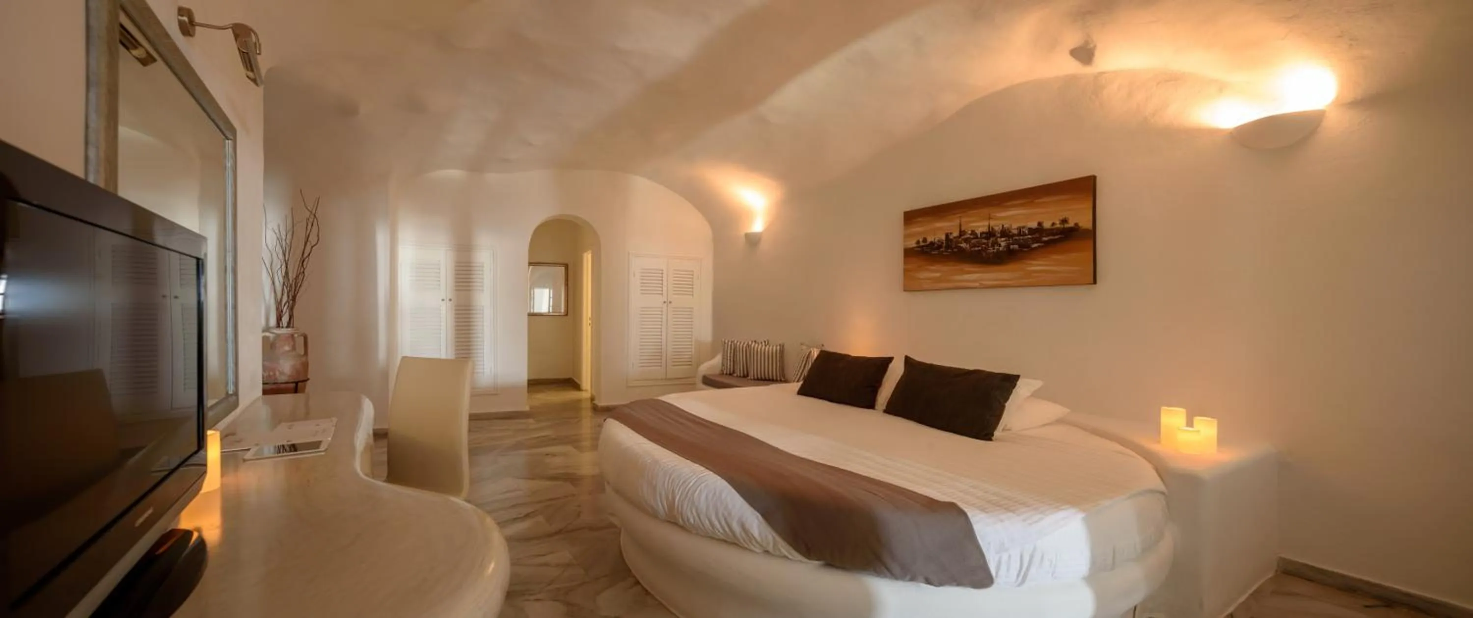 Bed in Pegasus Suites & Spa