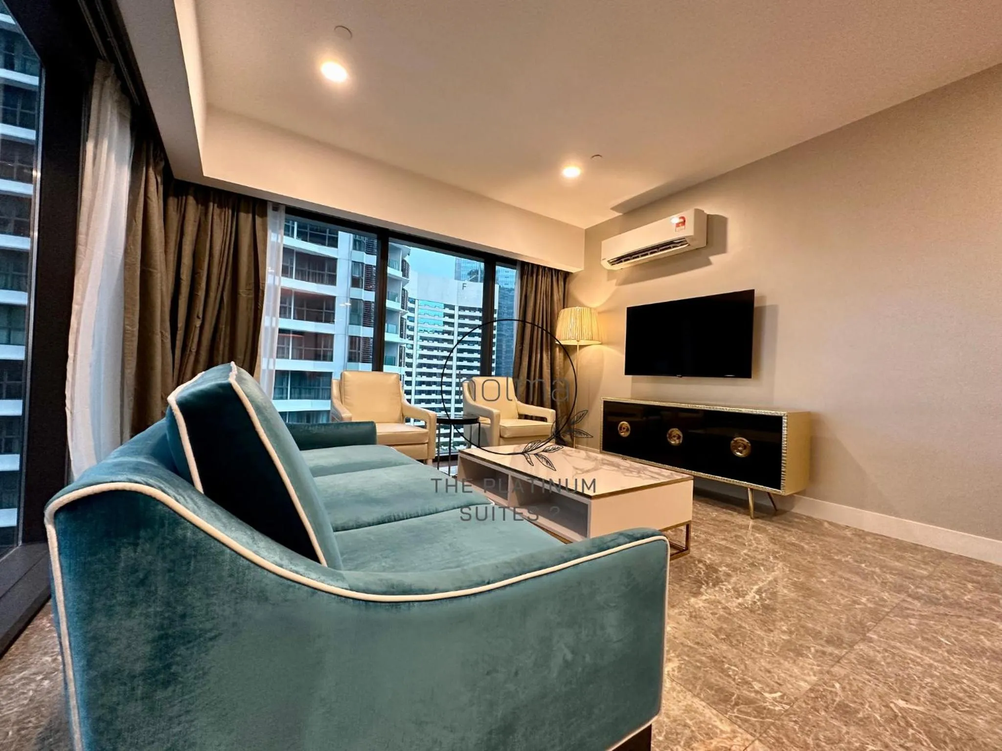 Living room in The Platinum 2 Kuala Lumpur by HOLMA
