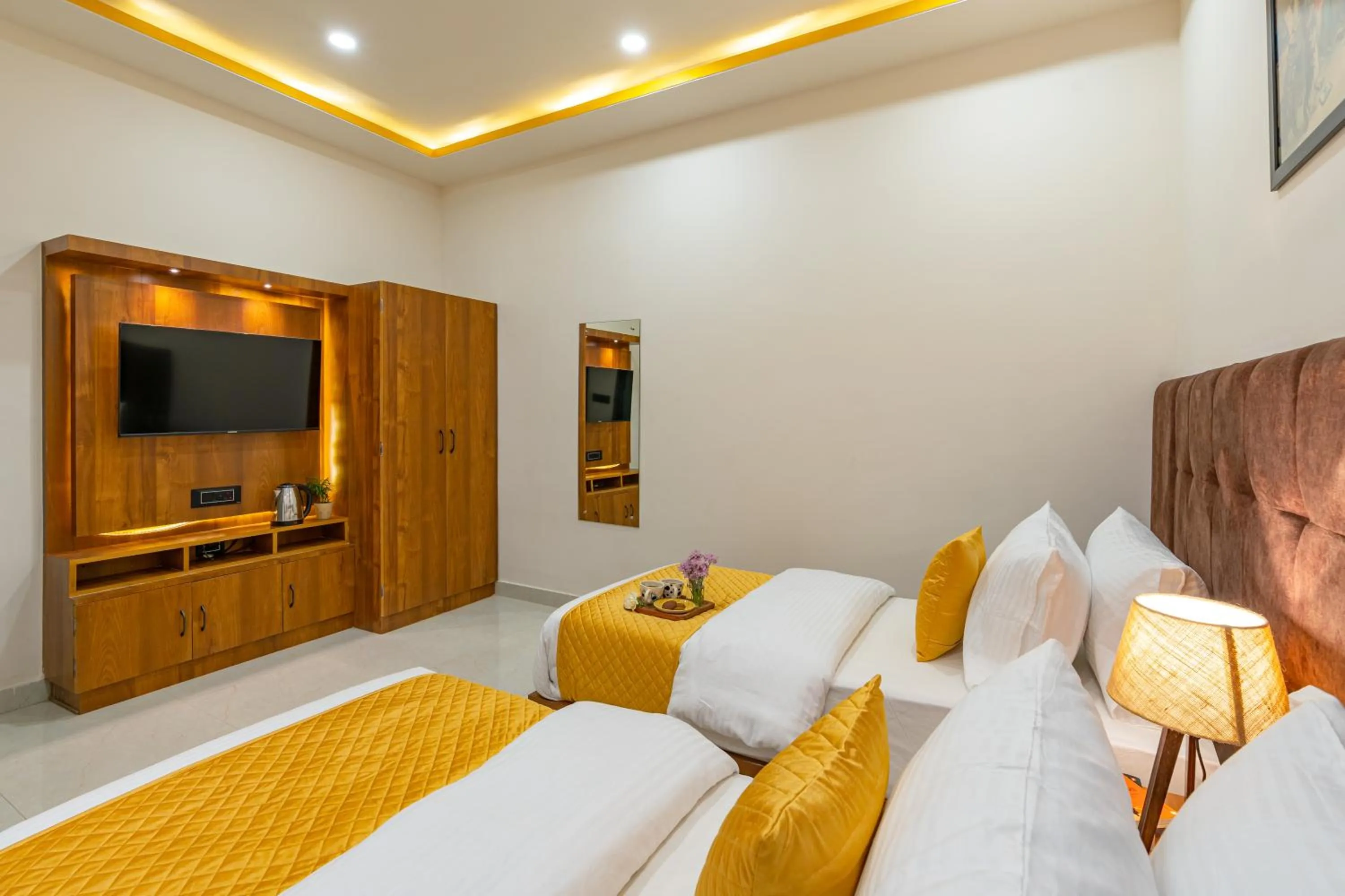 Communal lounge/ TV room, Bed in The Social Stays Jaipur formerly ArtBuzz