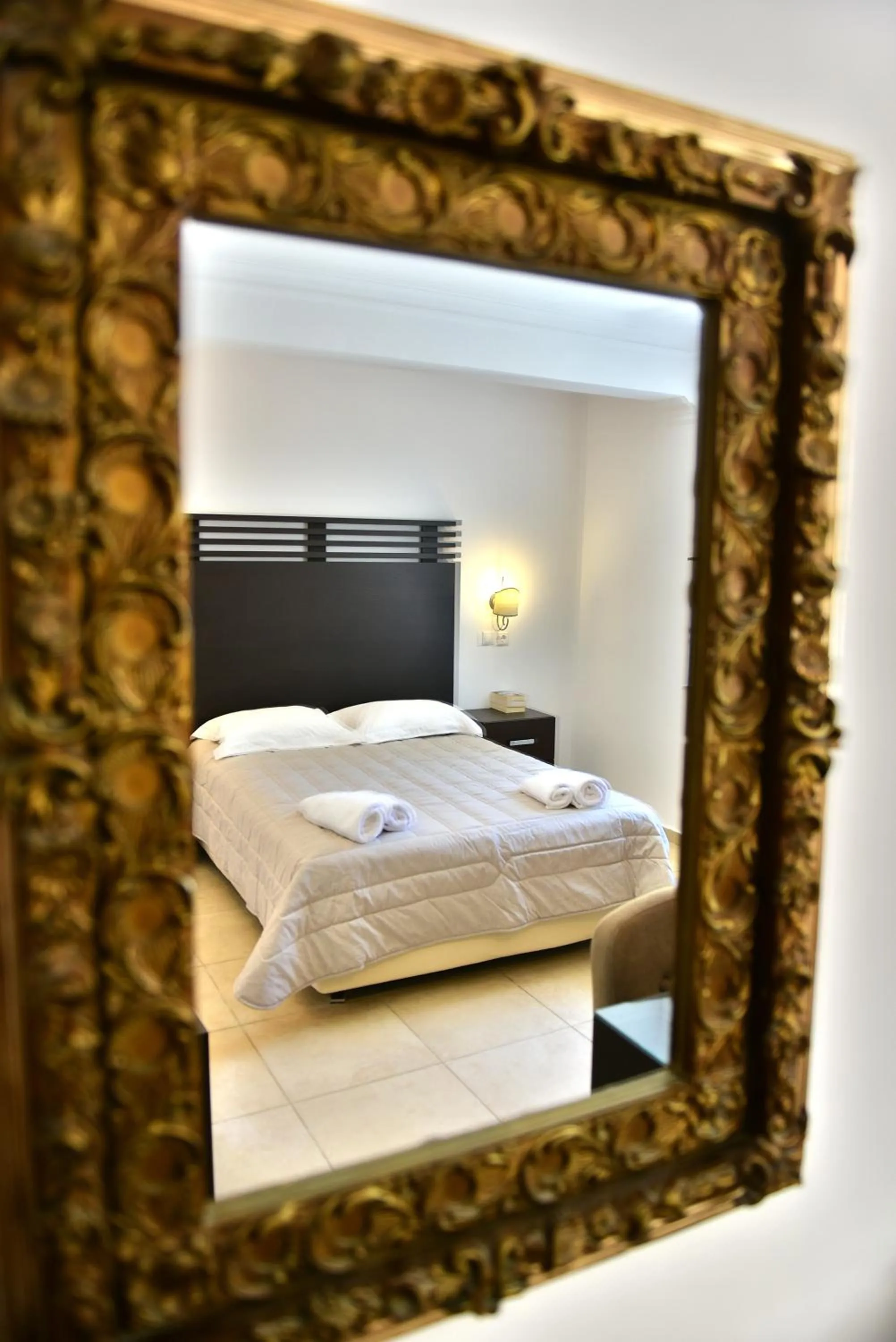 Bed in Mistral Hotel