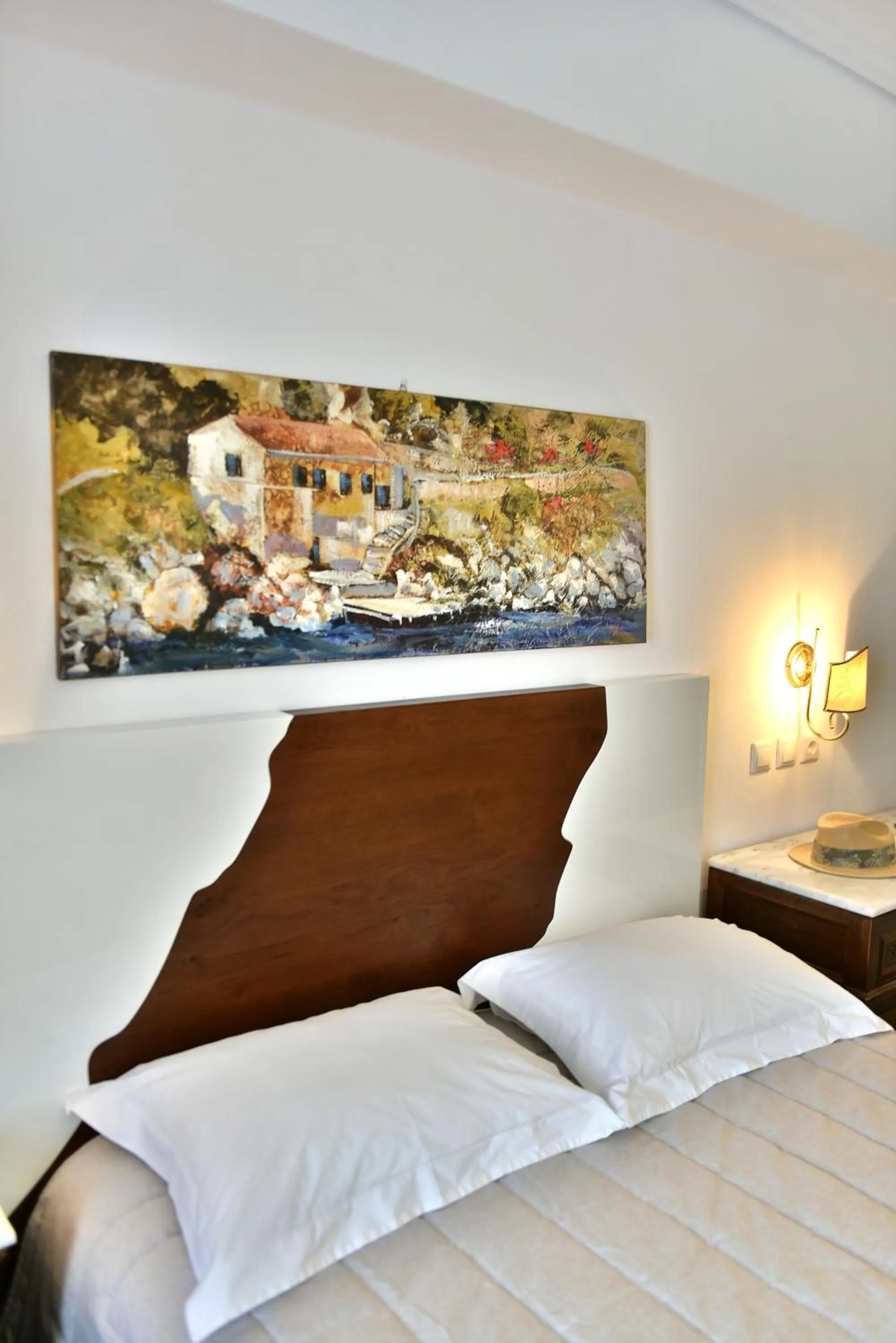 Bed in Mistral Hotel