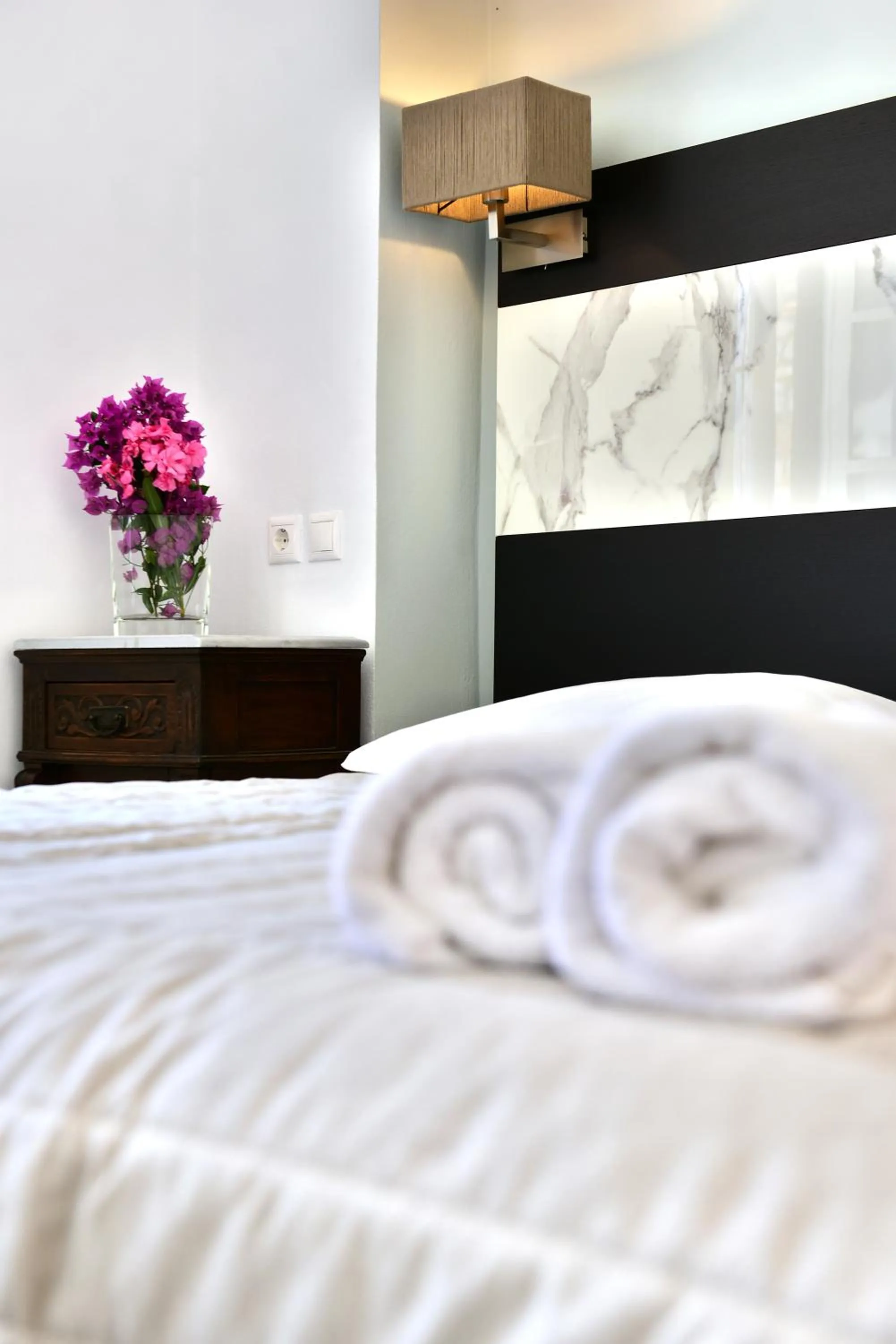 Bed in Mistral Hotel