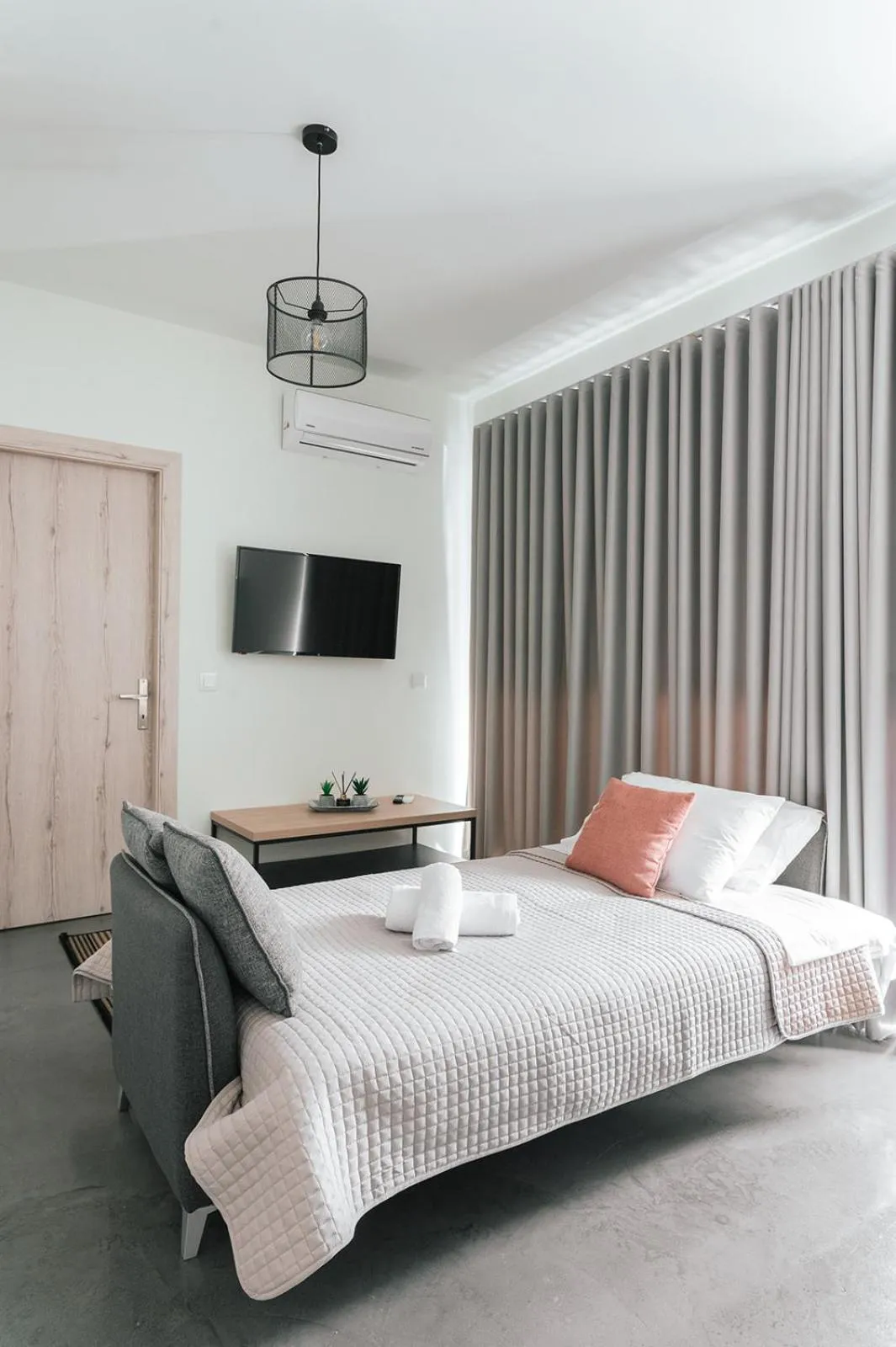 Bed in MAGNOLIA SUITES