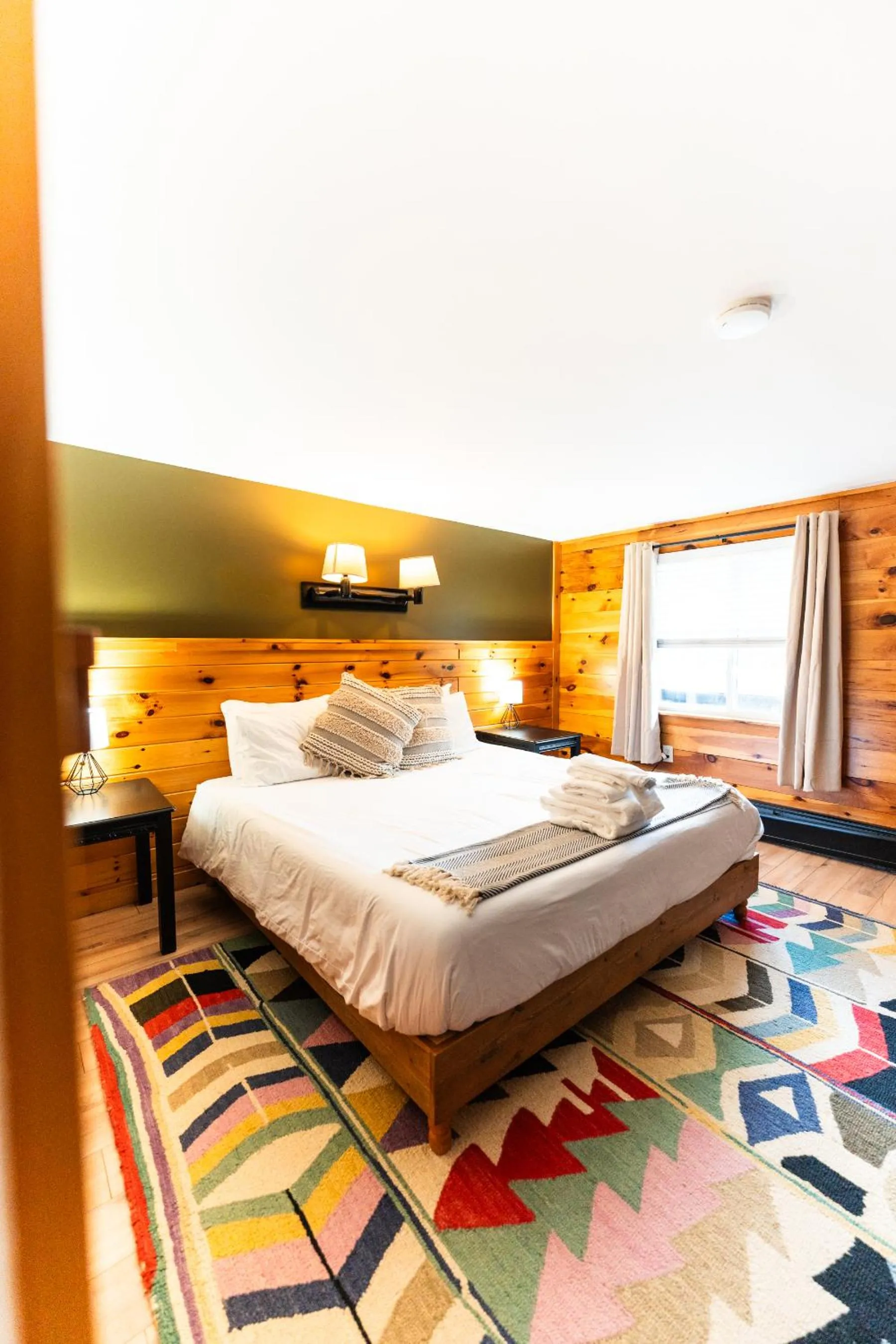 Bed in Wolfjaw Lodge