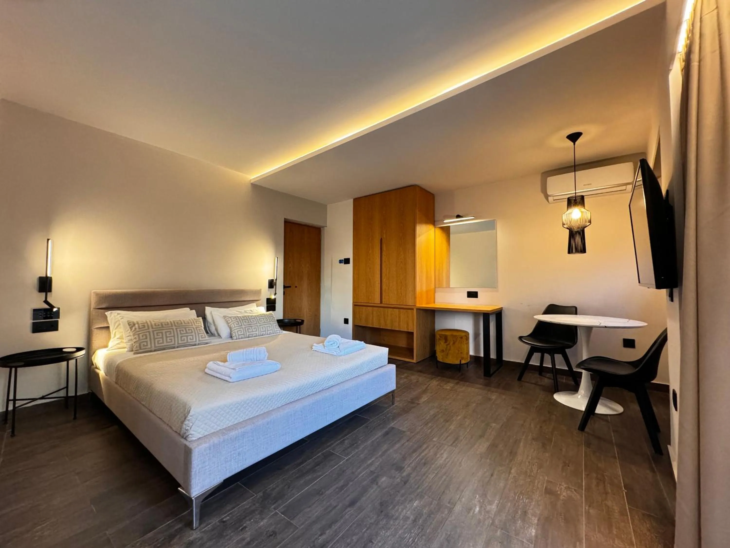 Bed in Elina Hotel Apartments