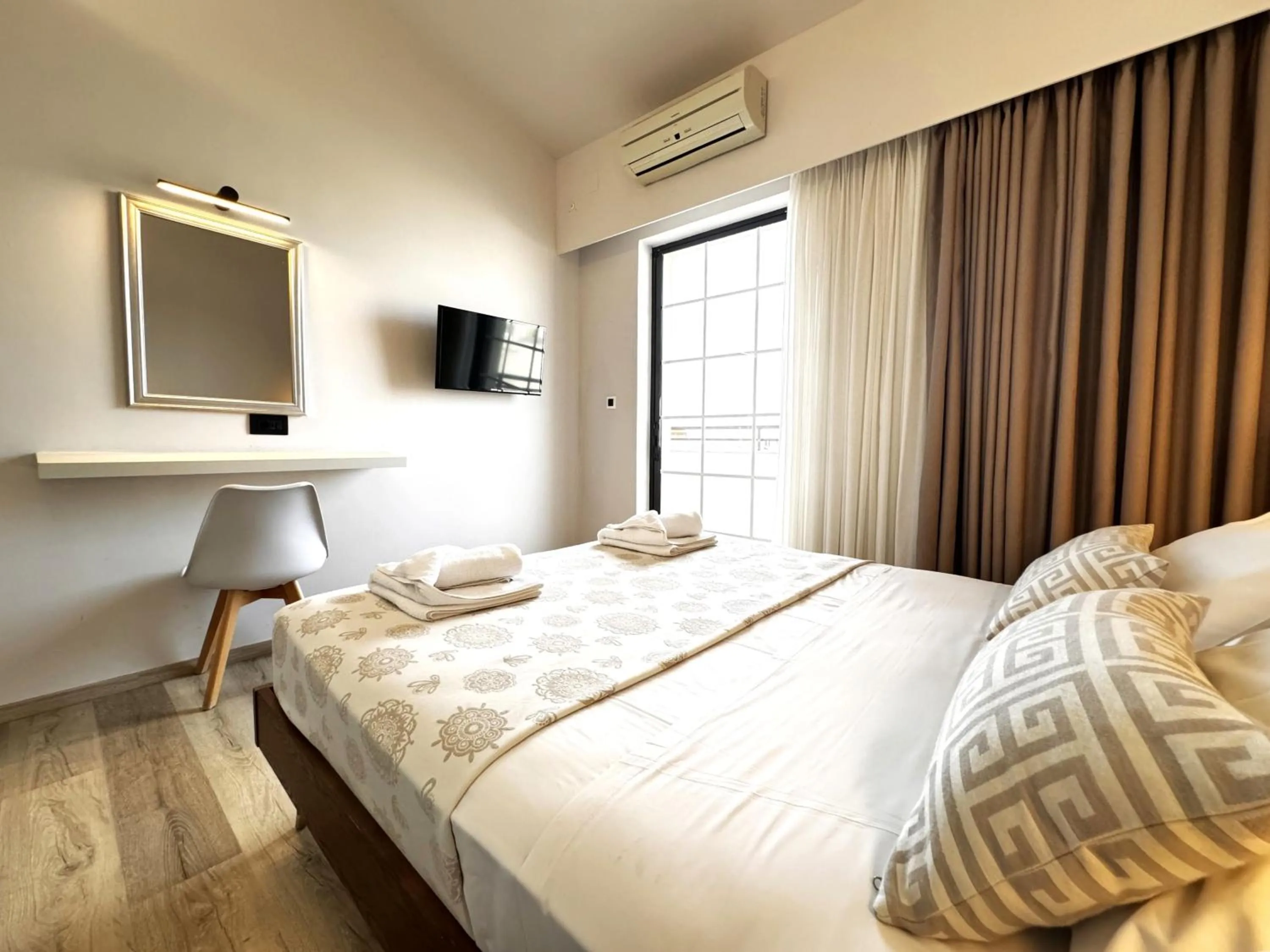 Bed in Elina Hotel Apartments