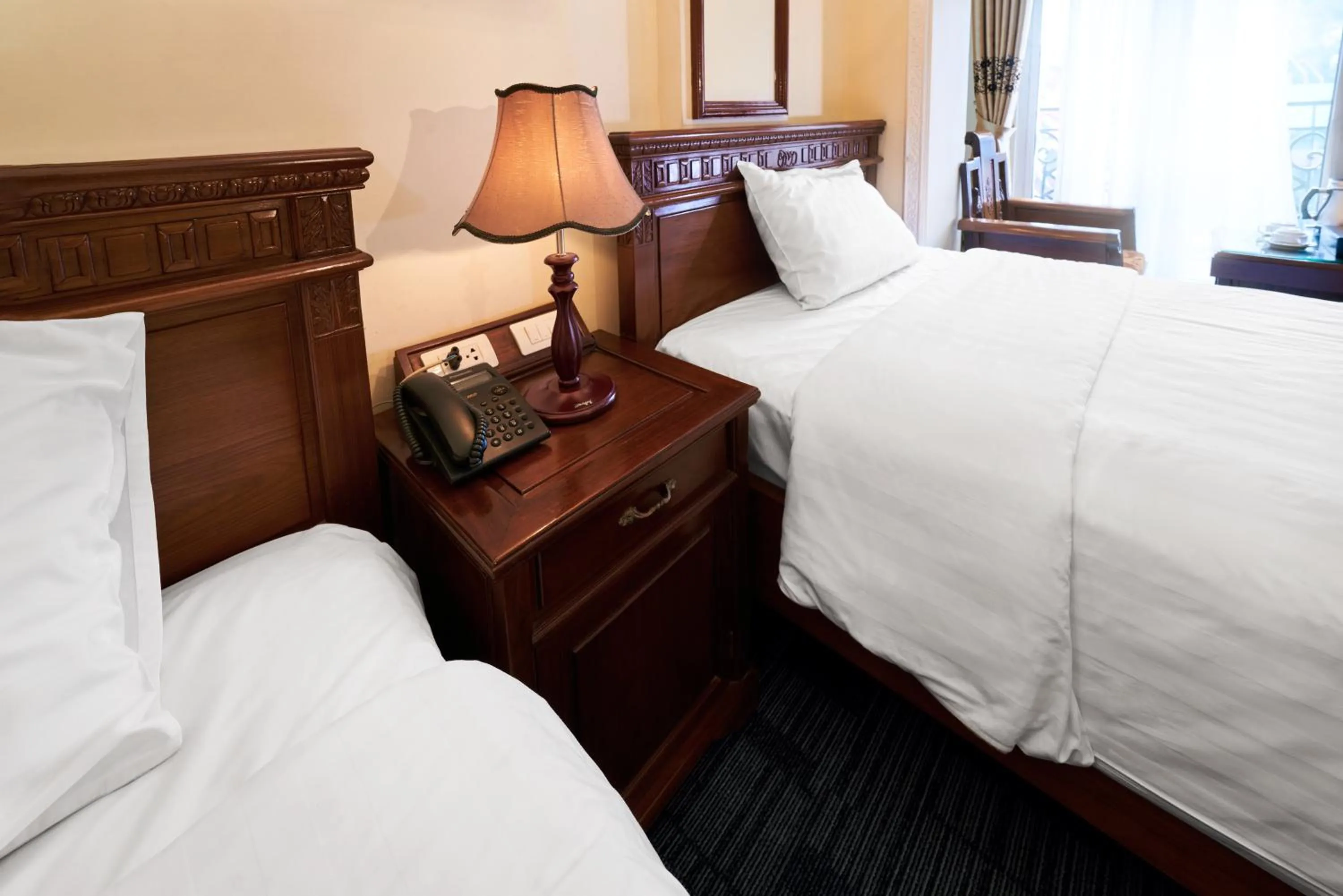 Bed in EDEN HOTEL HÀ NỘI