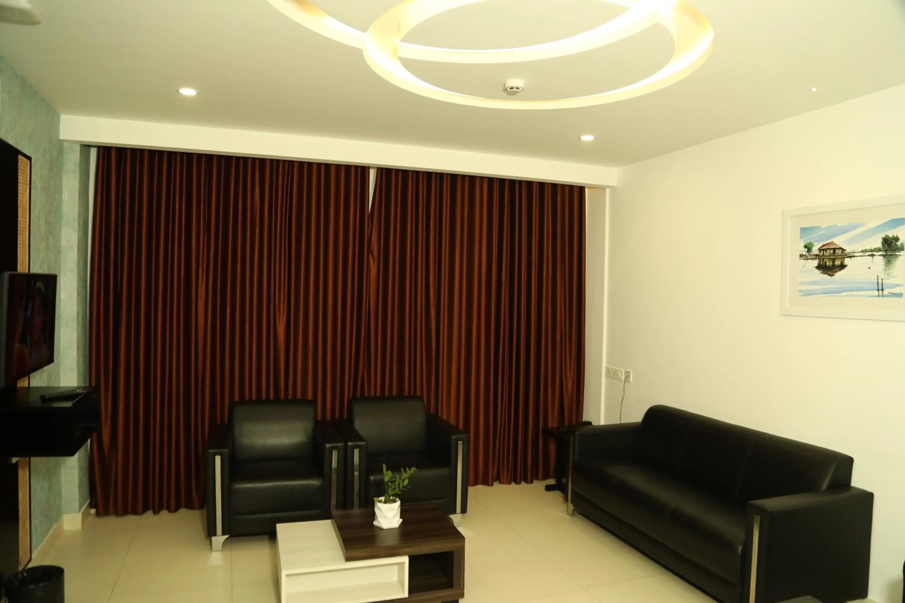 Living room in MARIYALAYAM MUNROE ISLAND RESIDENCY