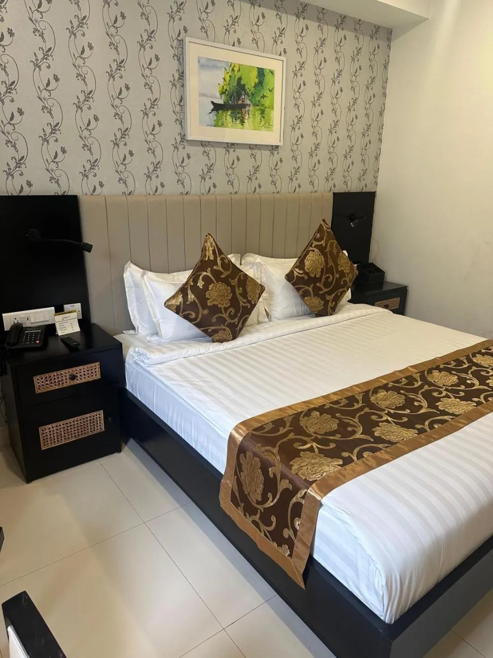 Bed in MARIYALAYAM MUNROE ISLAND RESIDENCY