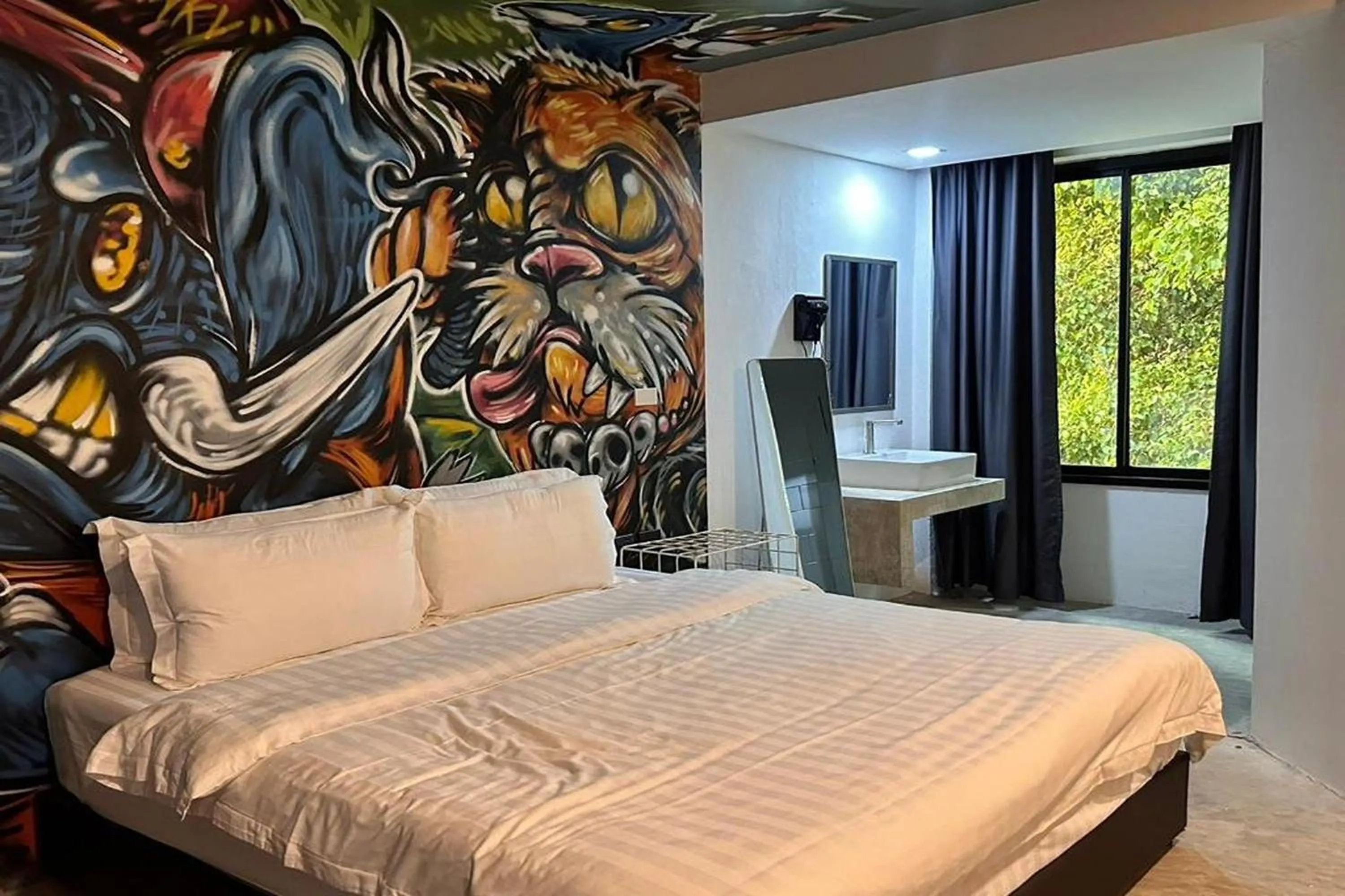 Photo of the whole room, Bed in BW Studios thai art style