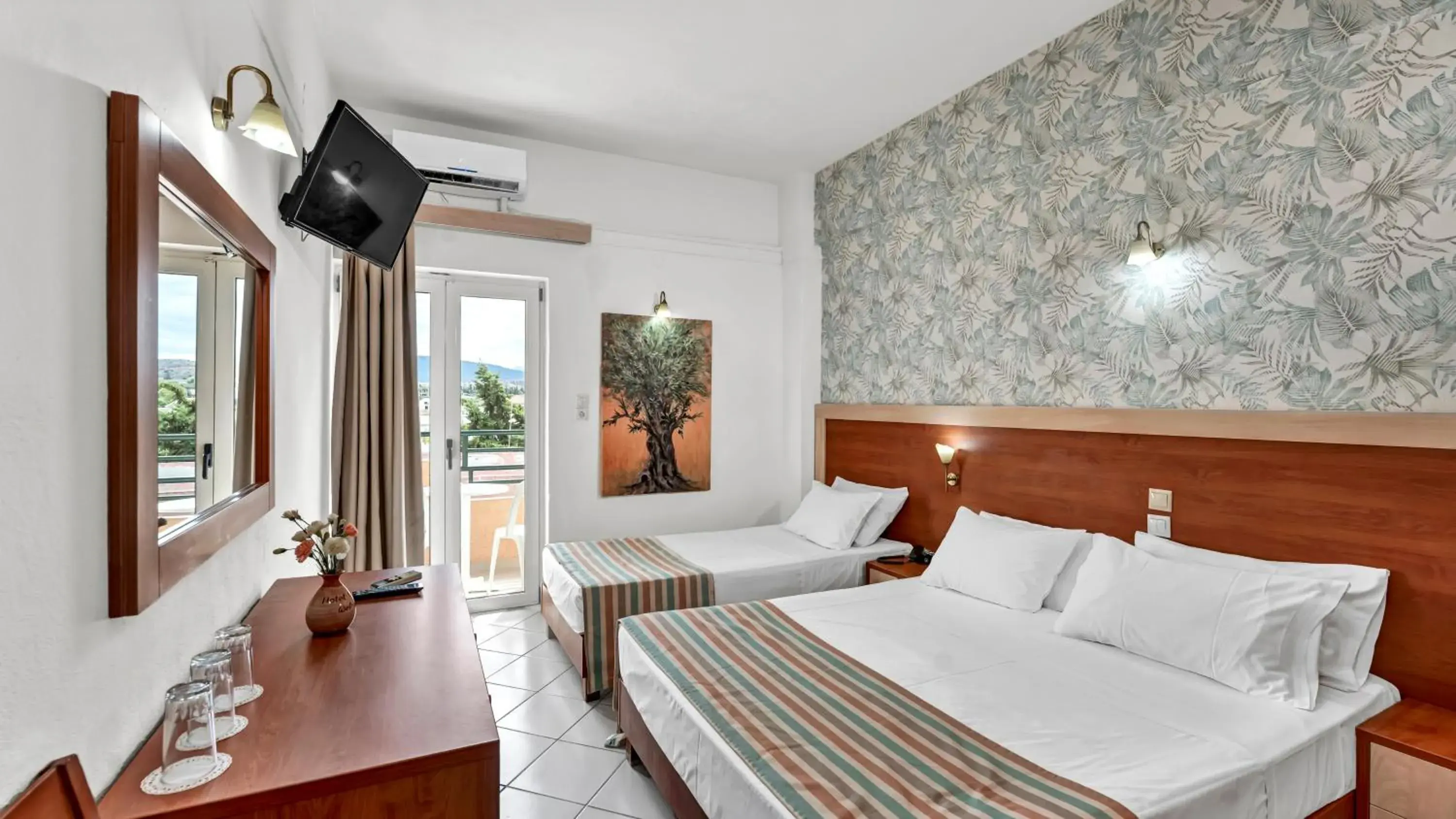 Standard Triple Room in Erato Hotel Standard Triple Room in Erato Hotel