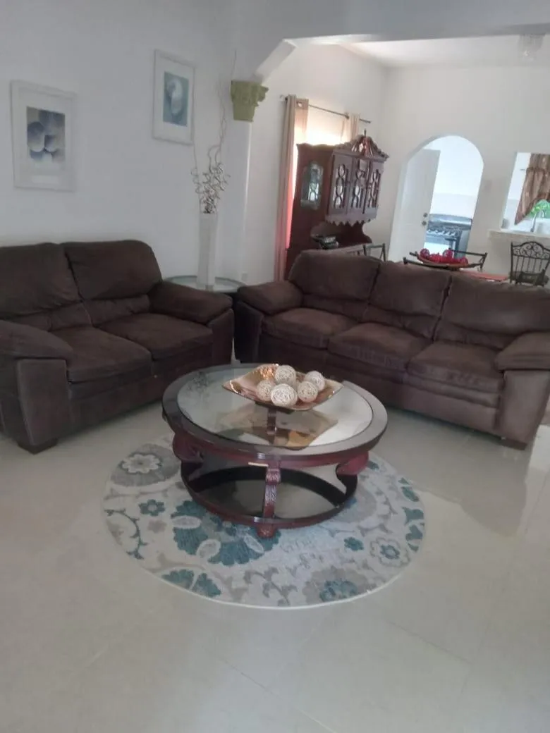 Living room in Comfy Guest Rooms