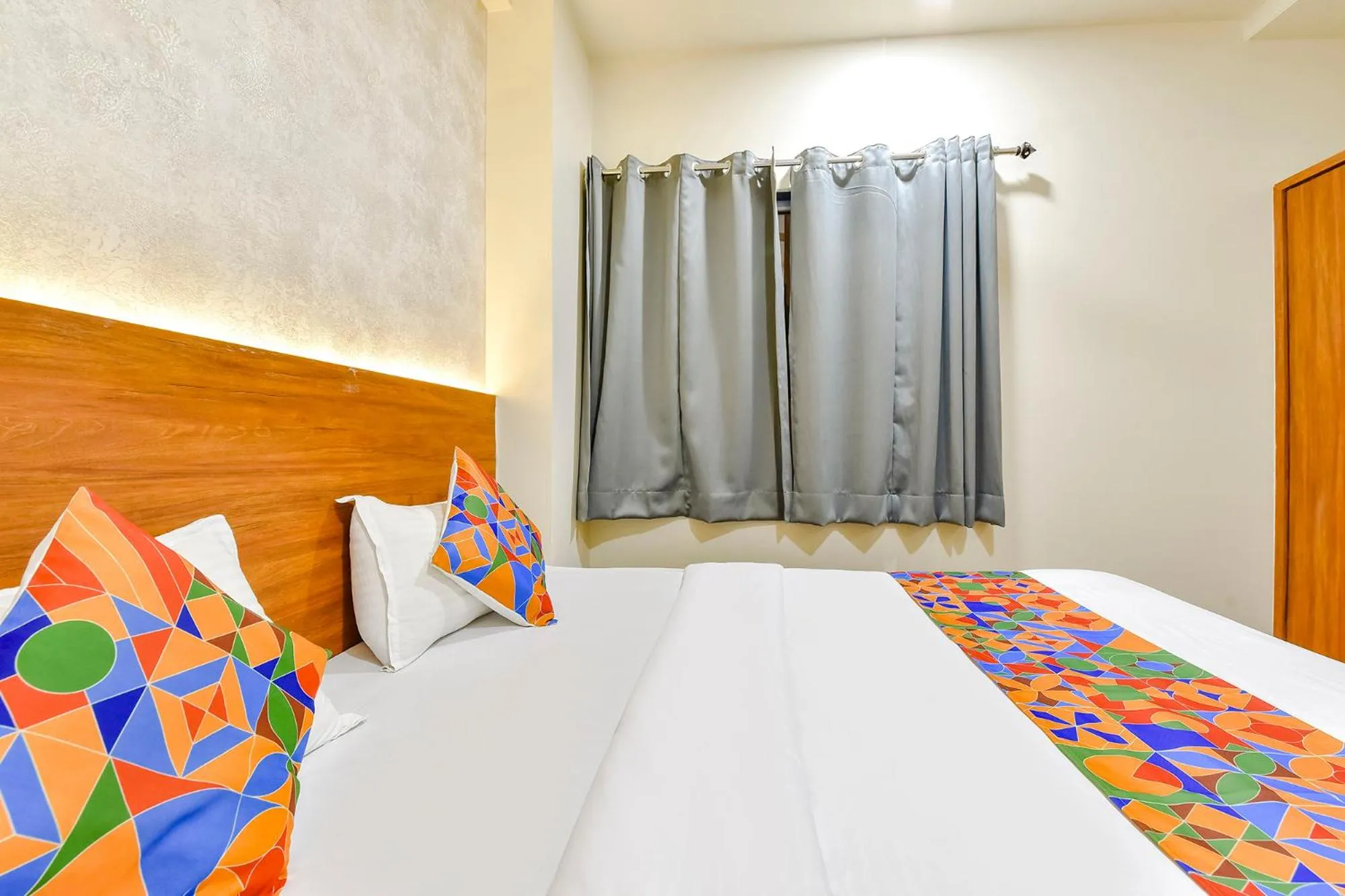 Bed in FabHotel KPL Prime