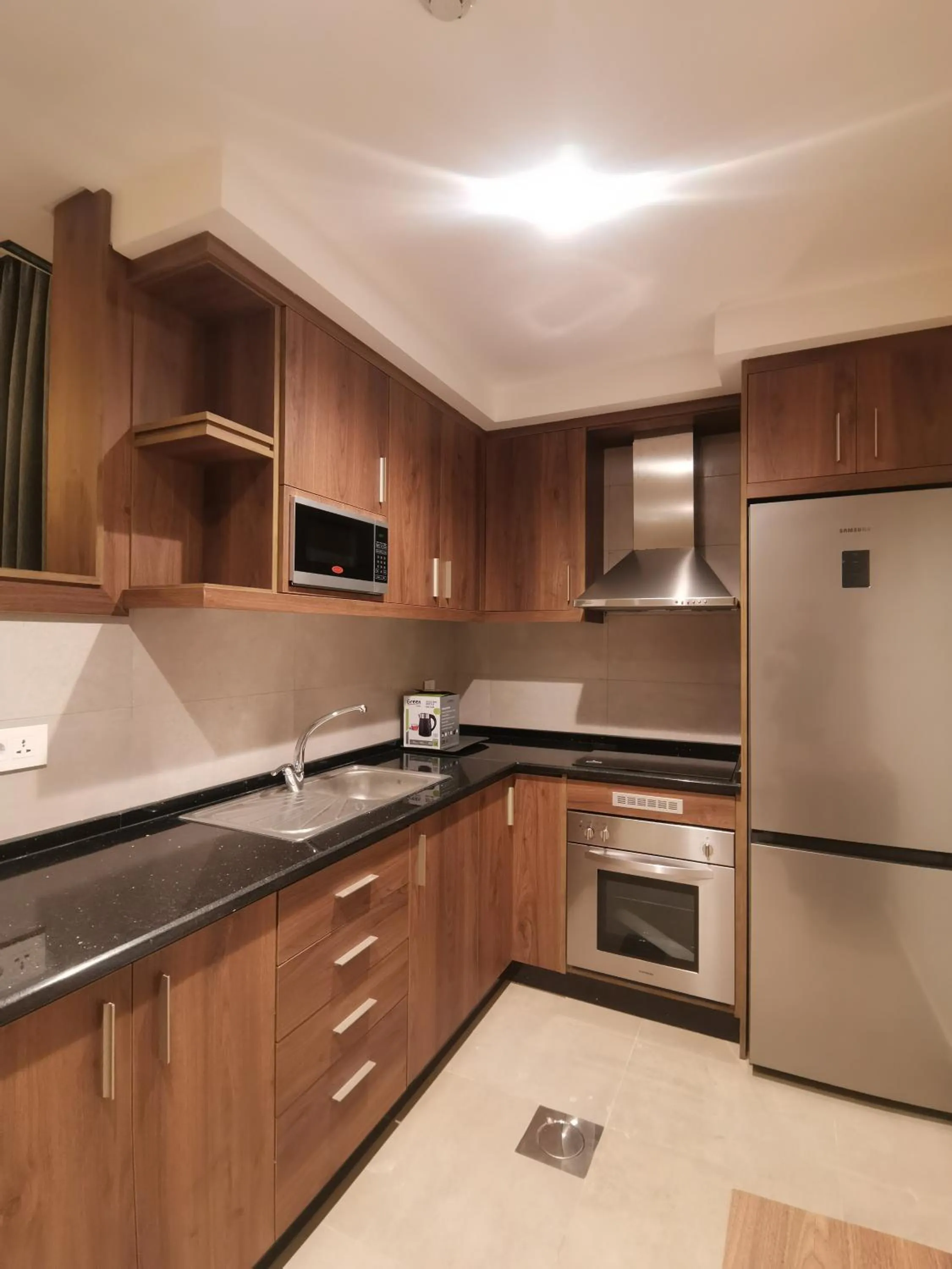 Kitchen or kitchenette in Dara apartment hotel
