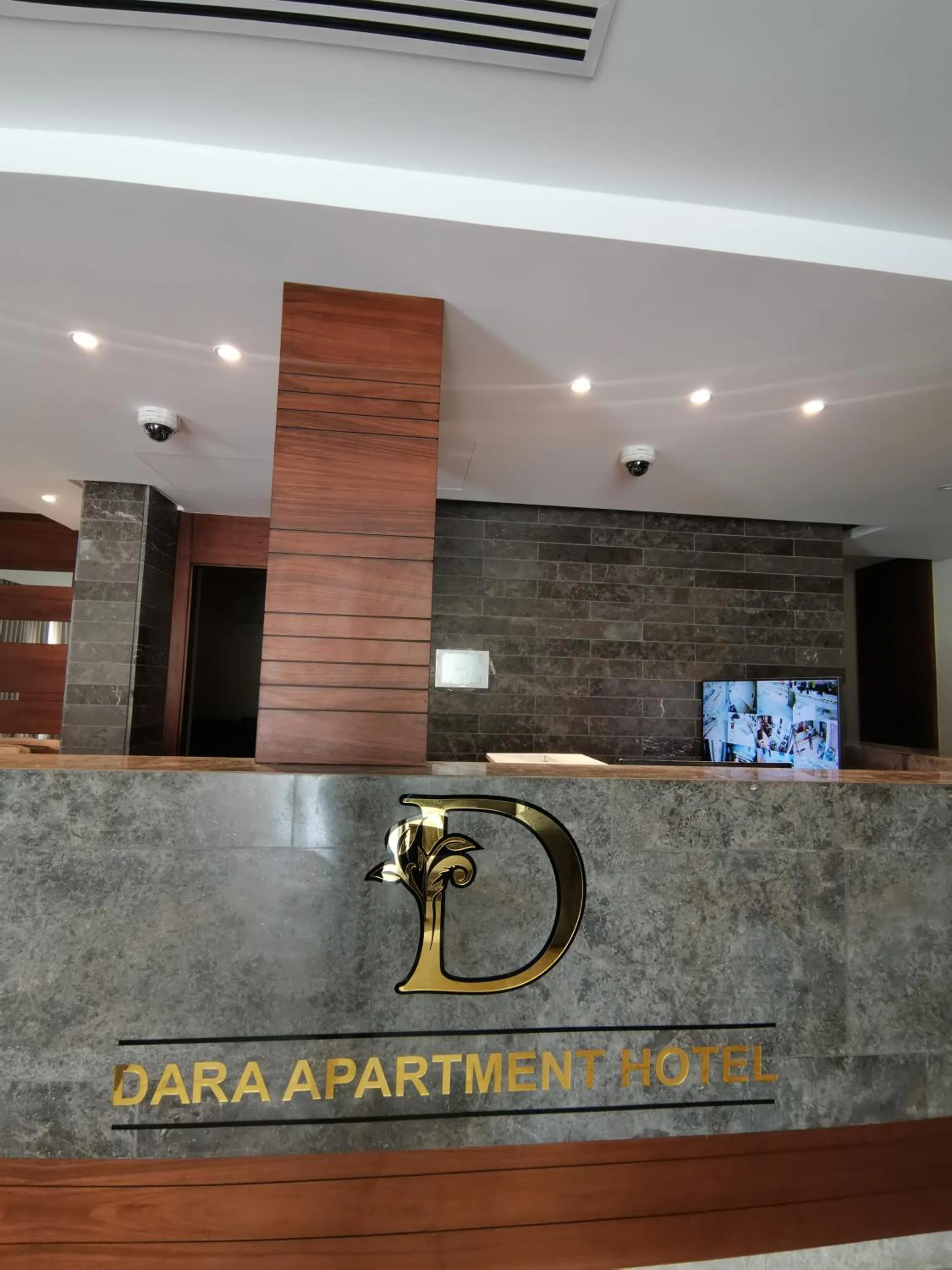 Property logo or sign in Dara apartment hotel
